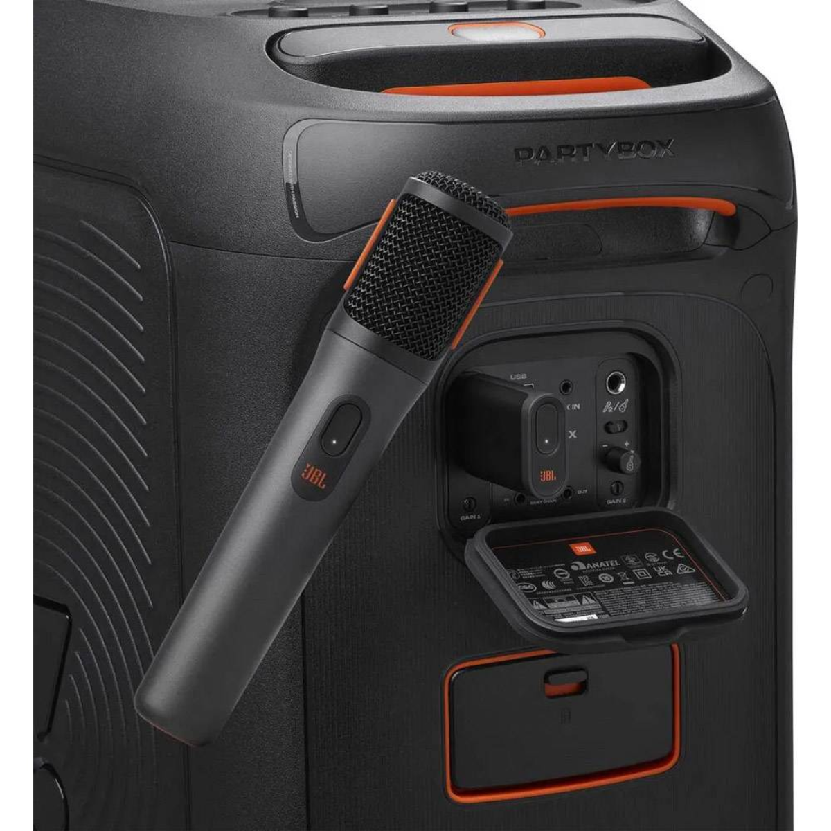 Une enceinte JBL PartyBox noire avec un microphone et un panneau de contrôle.