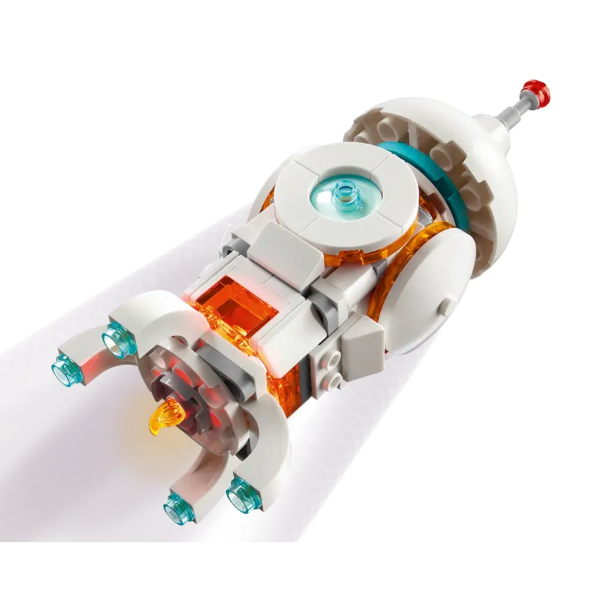 Model Lego białego pojazdu kosmicznego z pomarańczowymi i niebieskimi akcentami. Ma światło.