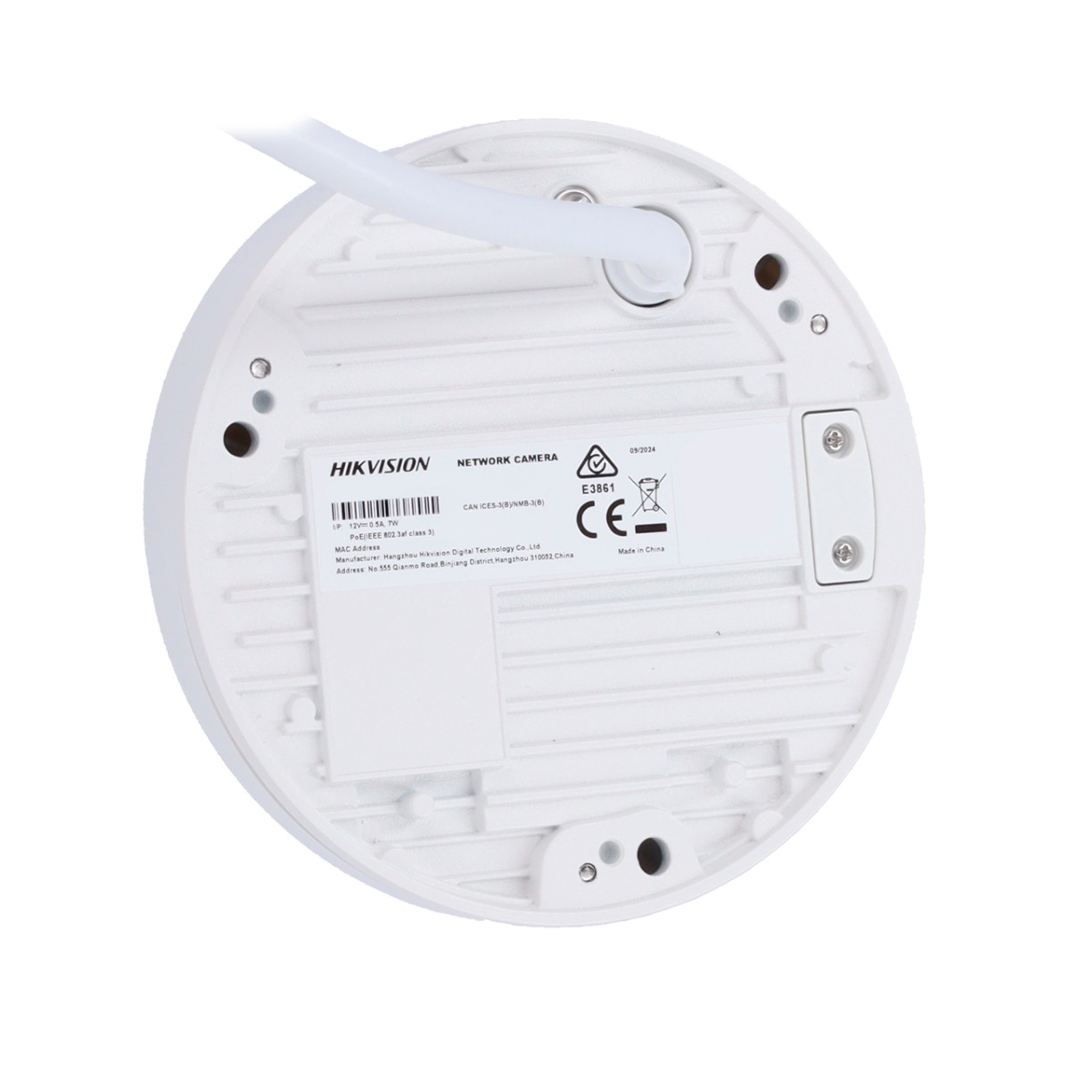 Biała podstawa kamery z etykietą, złączami i kablem.