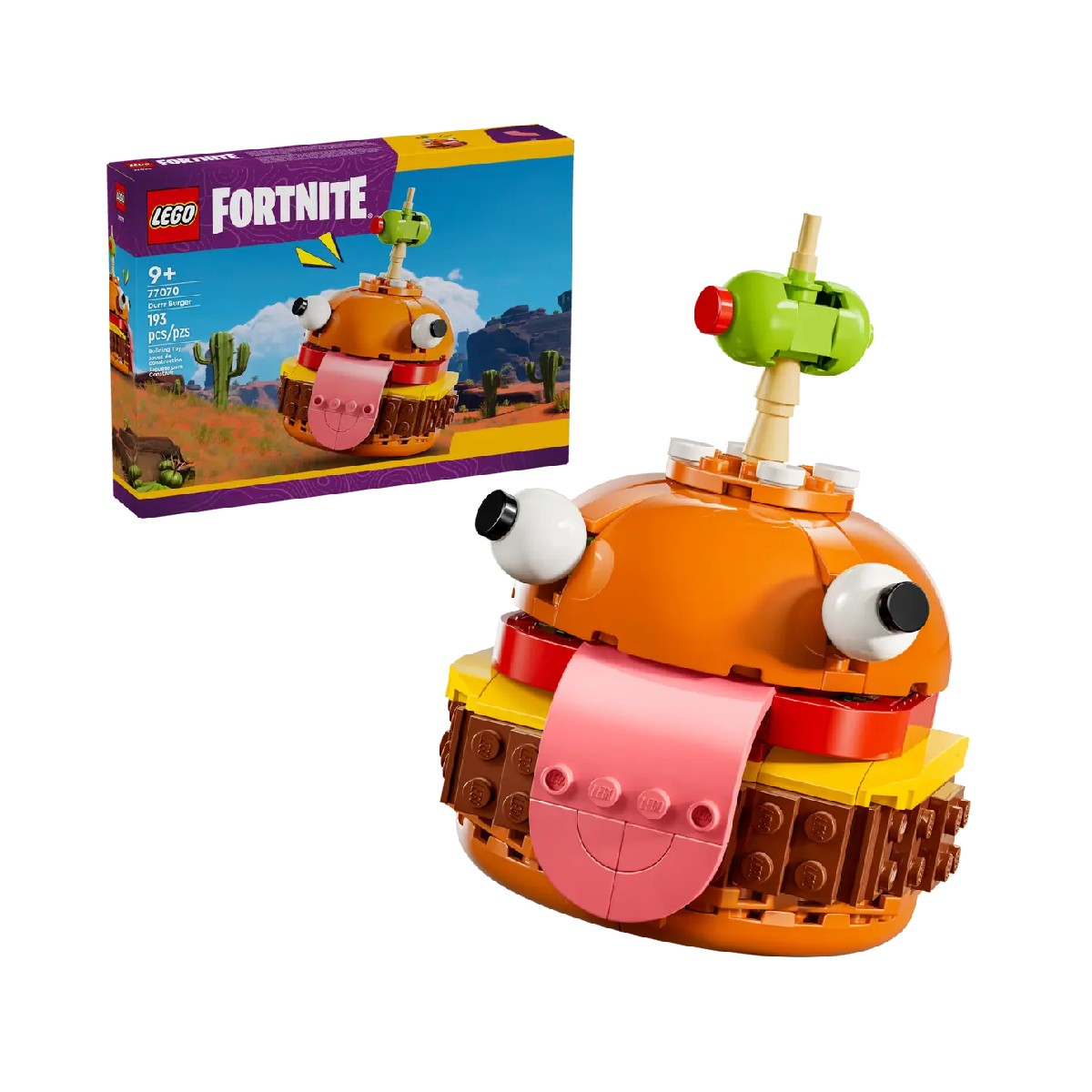 Lego-Set eines Burgers mit Kulleraugen und heraushängender Zunge. Schachtel im Hintergrund.