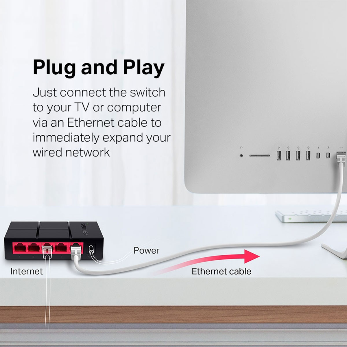 Urządzenie sieciowe podłączone kablem Ethernet do komputera.