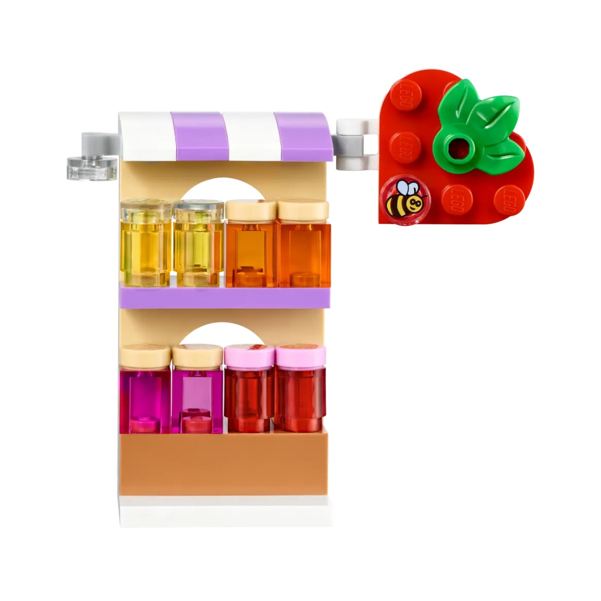 Negozio Lego con barattoli e una fragola. Tendone bianco e viola.