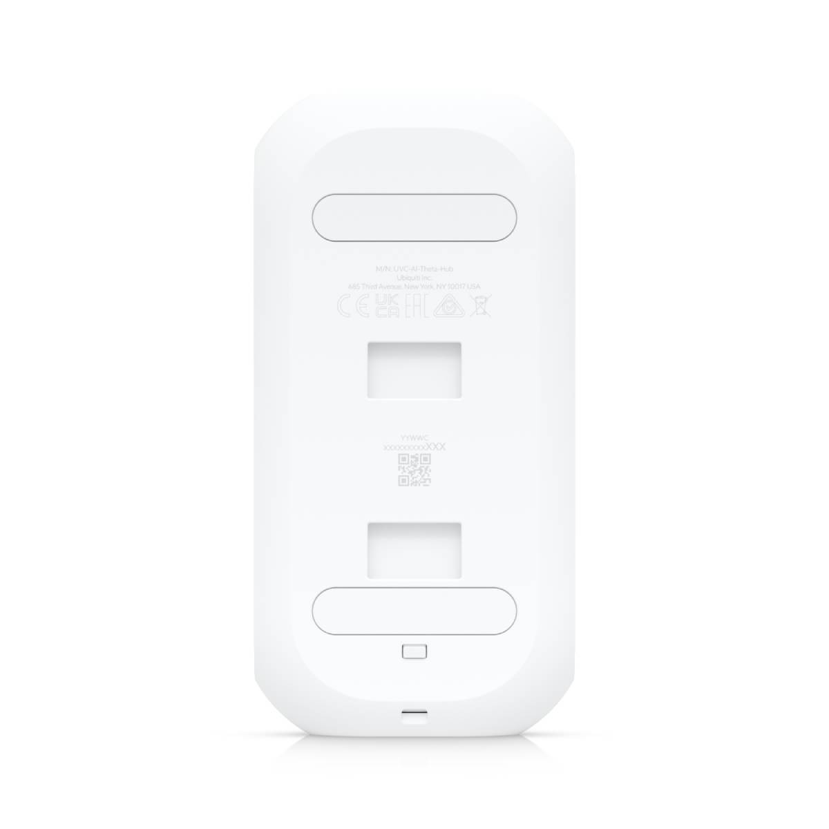 Białe, prostokątne urządzenie z portami i etykietami. Widok od spodu. Białe tło.