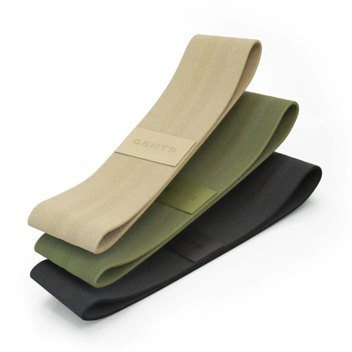 Three fabric resistance bands stacked. Beige, green and black. White background.