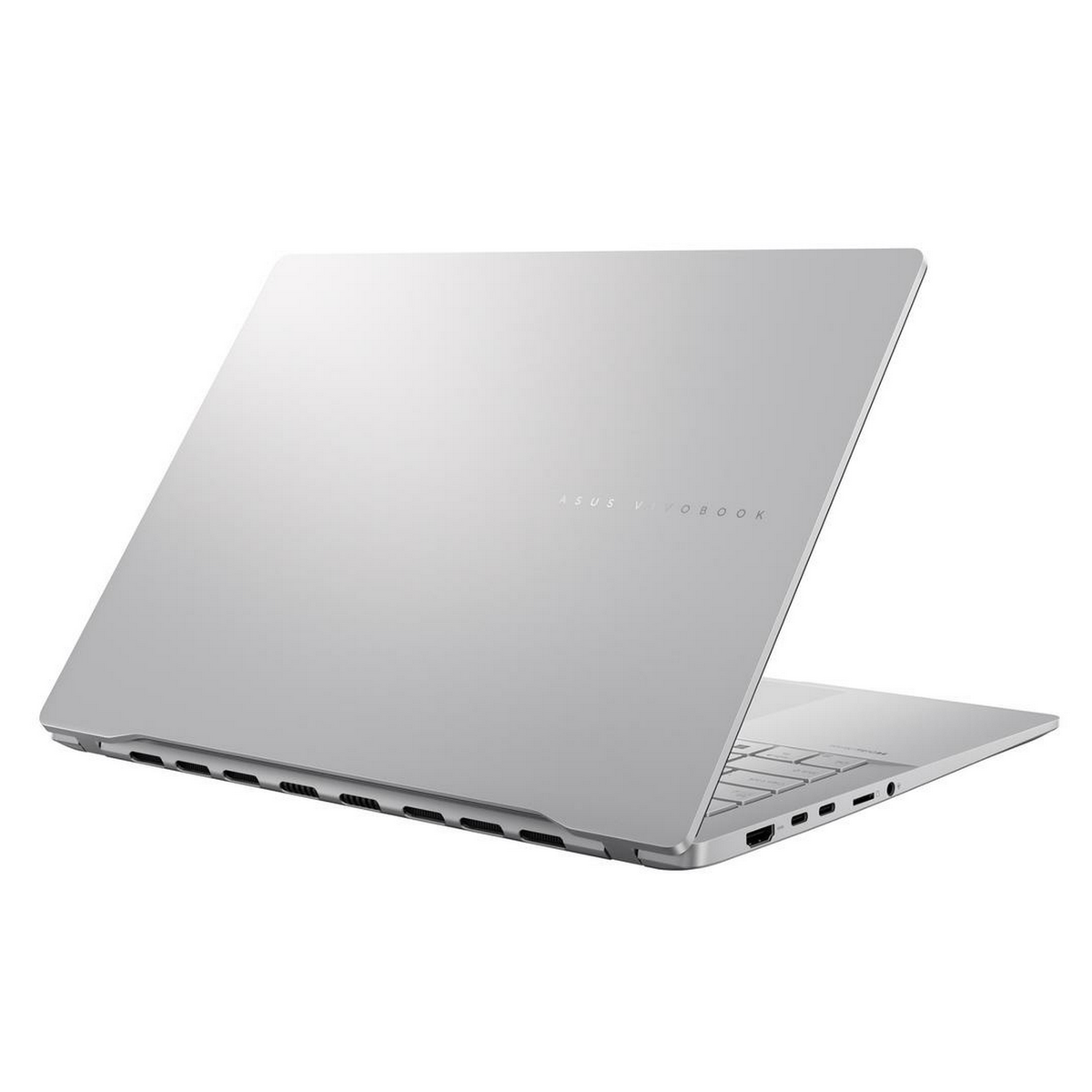 Portátil plateado con ASUS Vivobook escrito, girado hacia un lado. El fondo es blanco.
