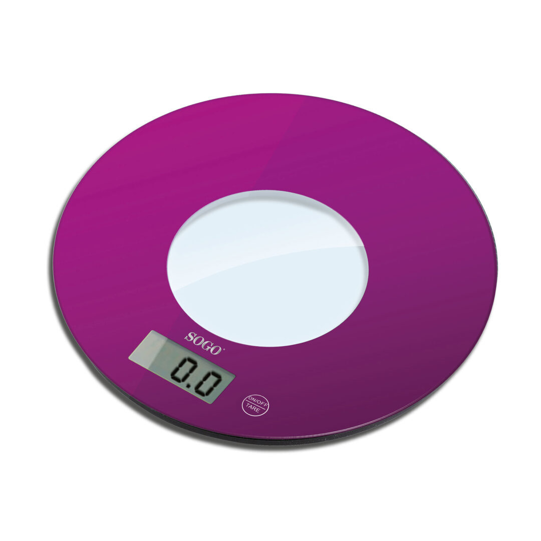 Balanza SOGO morada con pantalla digital que muestra '0.0' sobre fondo blanco.