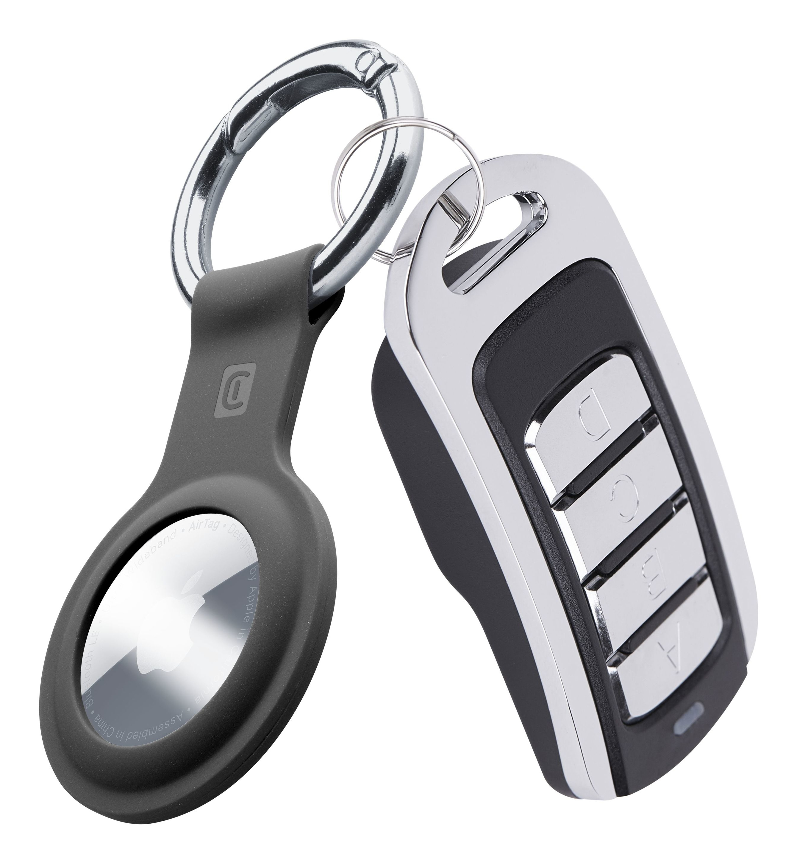 Brelok do kluczy i kluczyk do samochodu ze srebrnym kółkiem do kluczy.