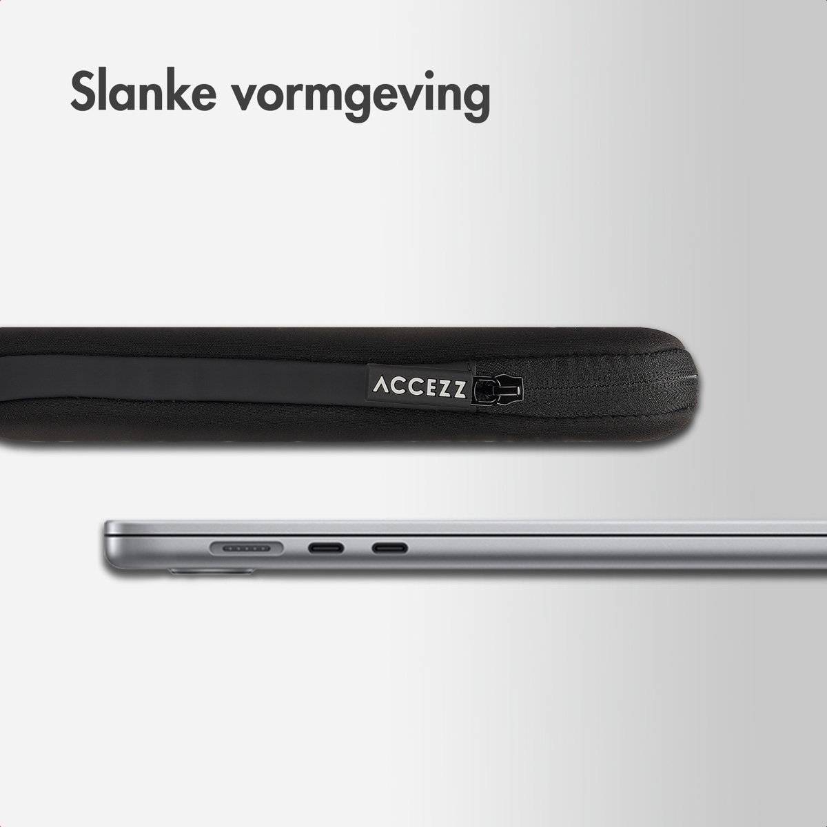 Black laptop sleeve with a silver laptop underneath. The sleeve has a zipper and the brand name ACCEZZ.