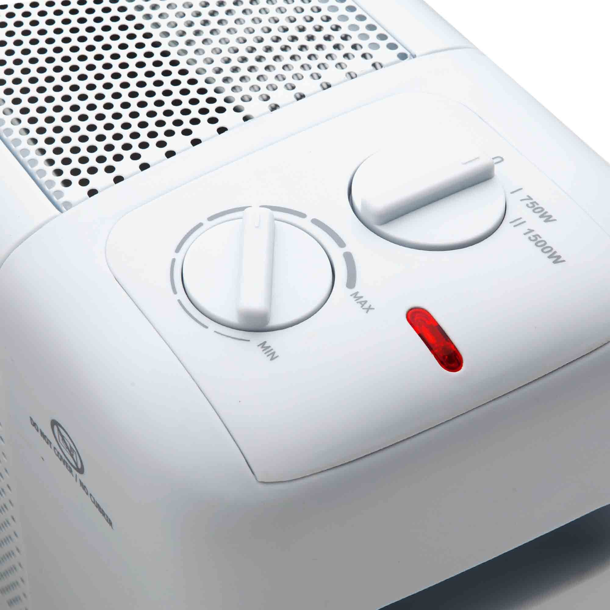 Controles de calefacción blancos. Dos perillas y una luz roja. Dice 'MAX' y 'MIN'.