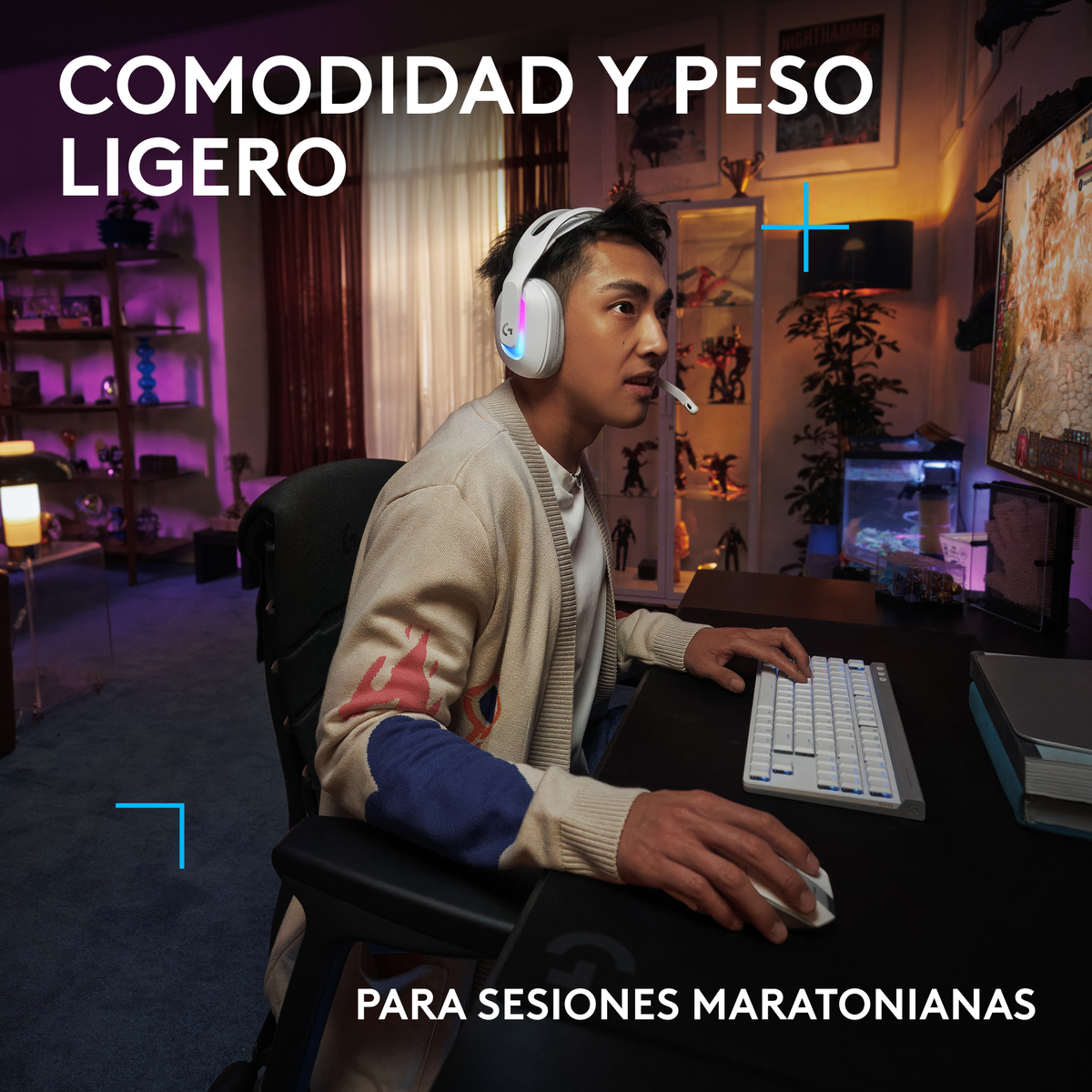 Man gaming with headset, keyboard, and mouse. Room has lights and a gaming screen.
