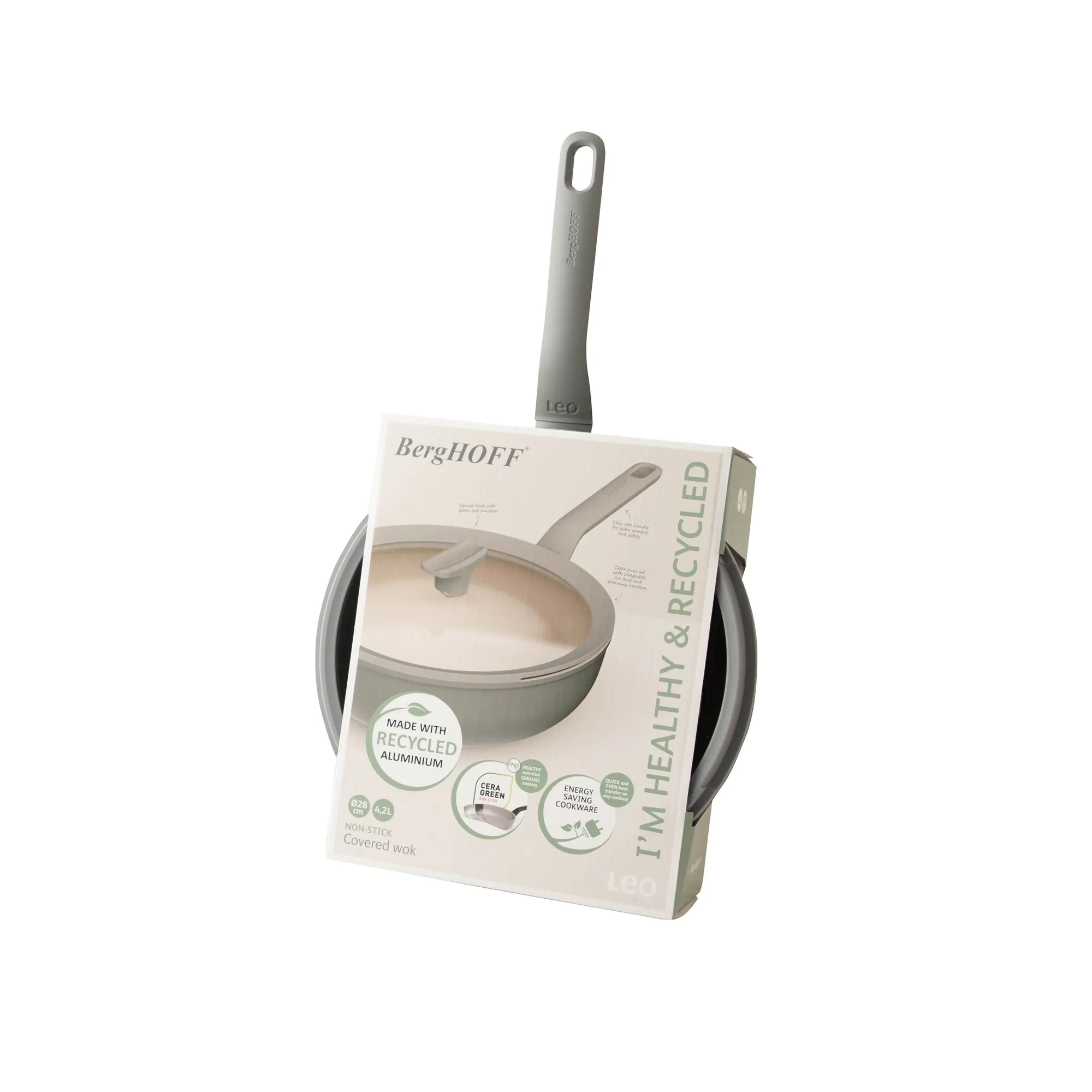 Grey frying pan with a handle, a box is placed in front of it. White background.