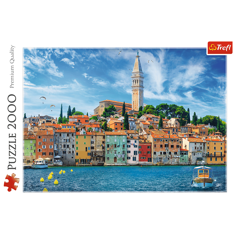 Puzzle z Rovinj, Chorwacja, z kolorowymi budynkami nad morzem i kościołem.