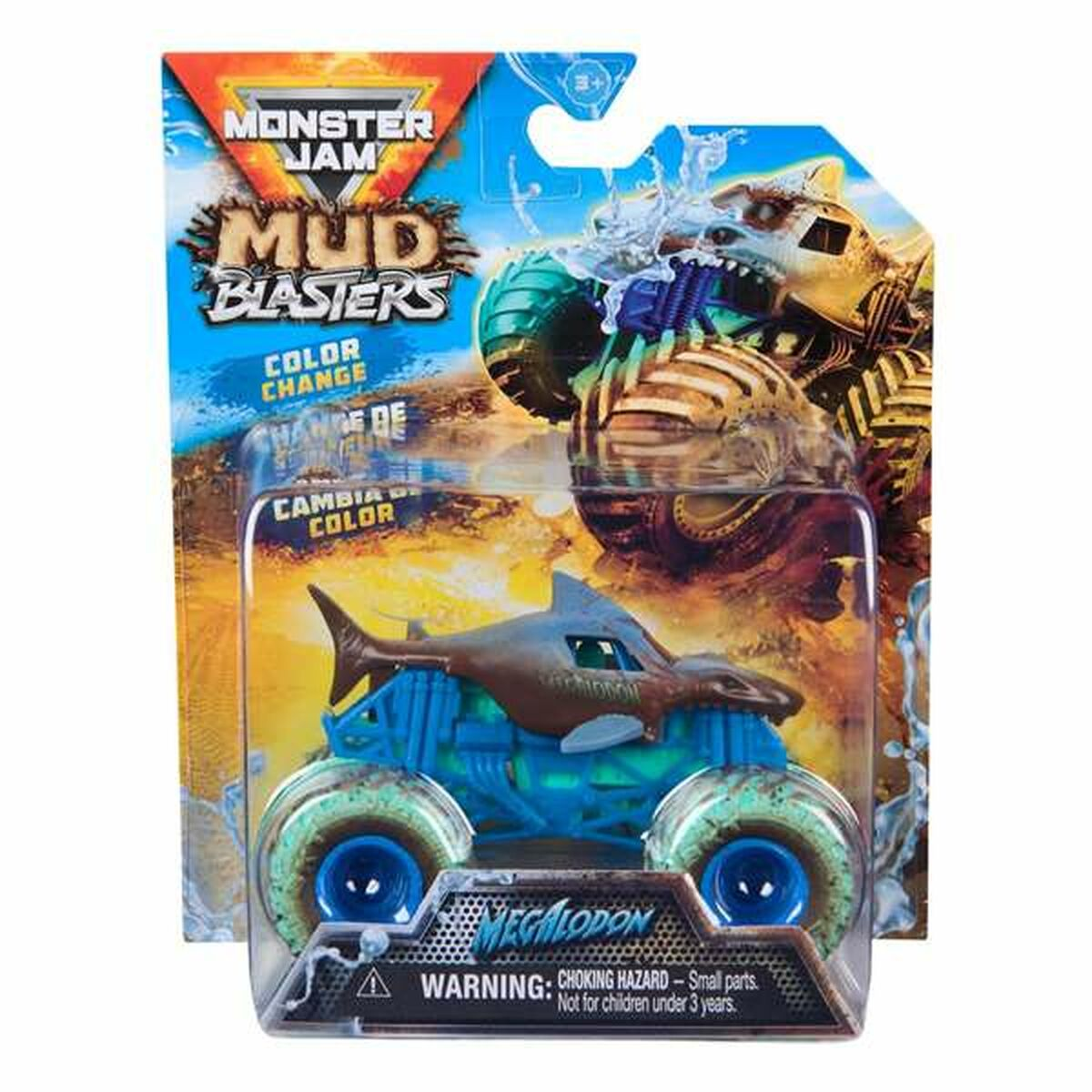 Zabawkowy monster truck z motywem rekina w opakowaniu. Ma niebieskie koła i korpus w kształcie rekina.