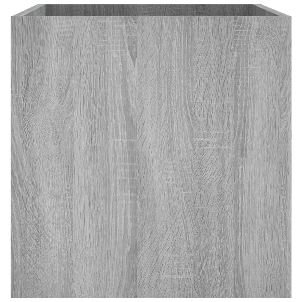Eine Nahaufnahme eines grauen Holzquaders mit sichtbarer Holzmaserung. Der Quader ist schlicht im Design.