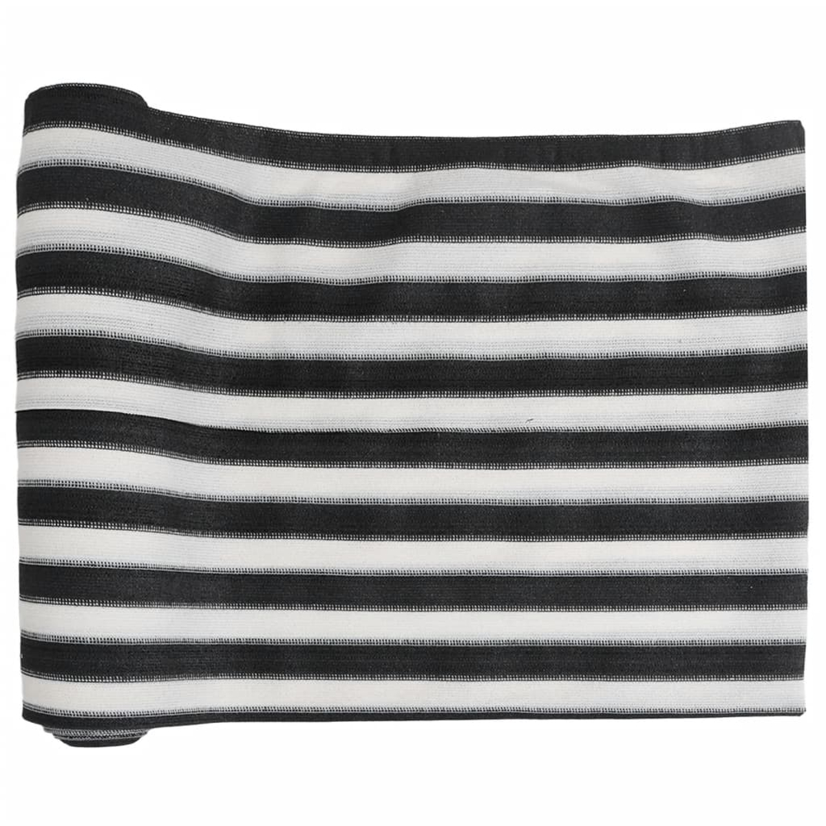 Aufgerollter Stoff mit schwarz-weißen Streifen. Die Streifen sind horizontal. Der Stoff ist aufgerollt.