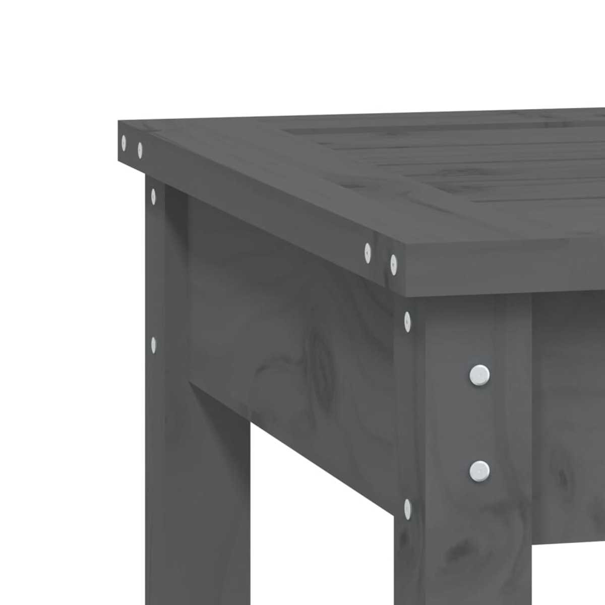 Nahaufnahme einer grauen Holztisch-Ecke. Bolzen sichern den Rahmen.