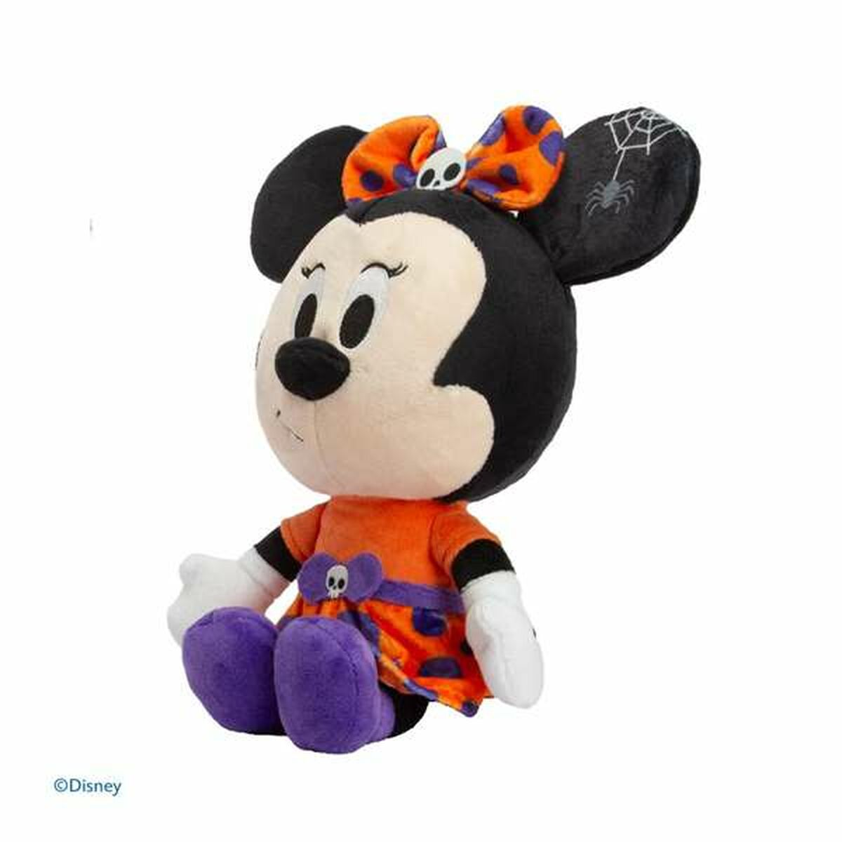 Minnie Mouse Plüschtier trägt ein orangefarbenes Kleid und eine Schleife mit Totenkopf, auf weißem Hintergrund.