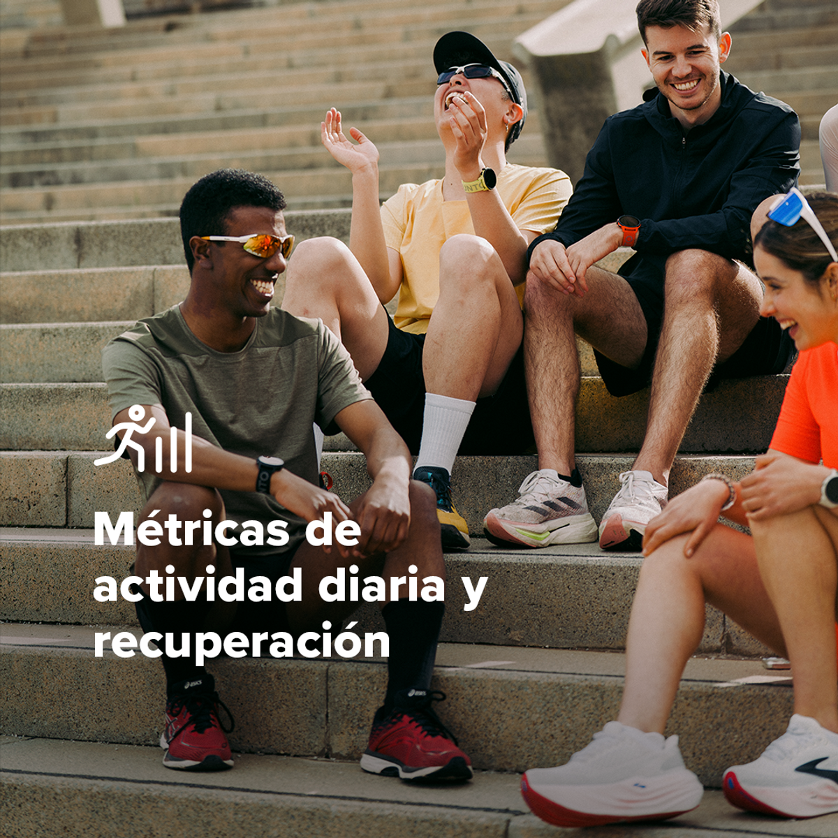 Grupa osób siedzących na schodach, noszących zegarki.