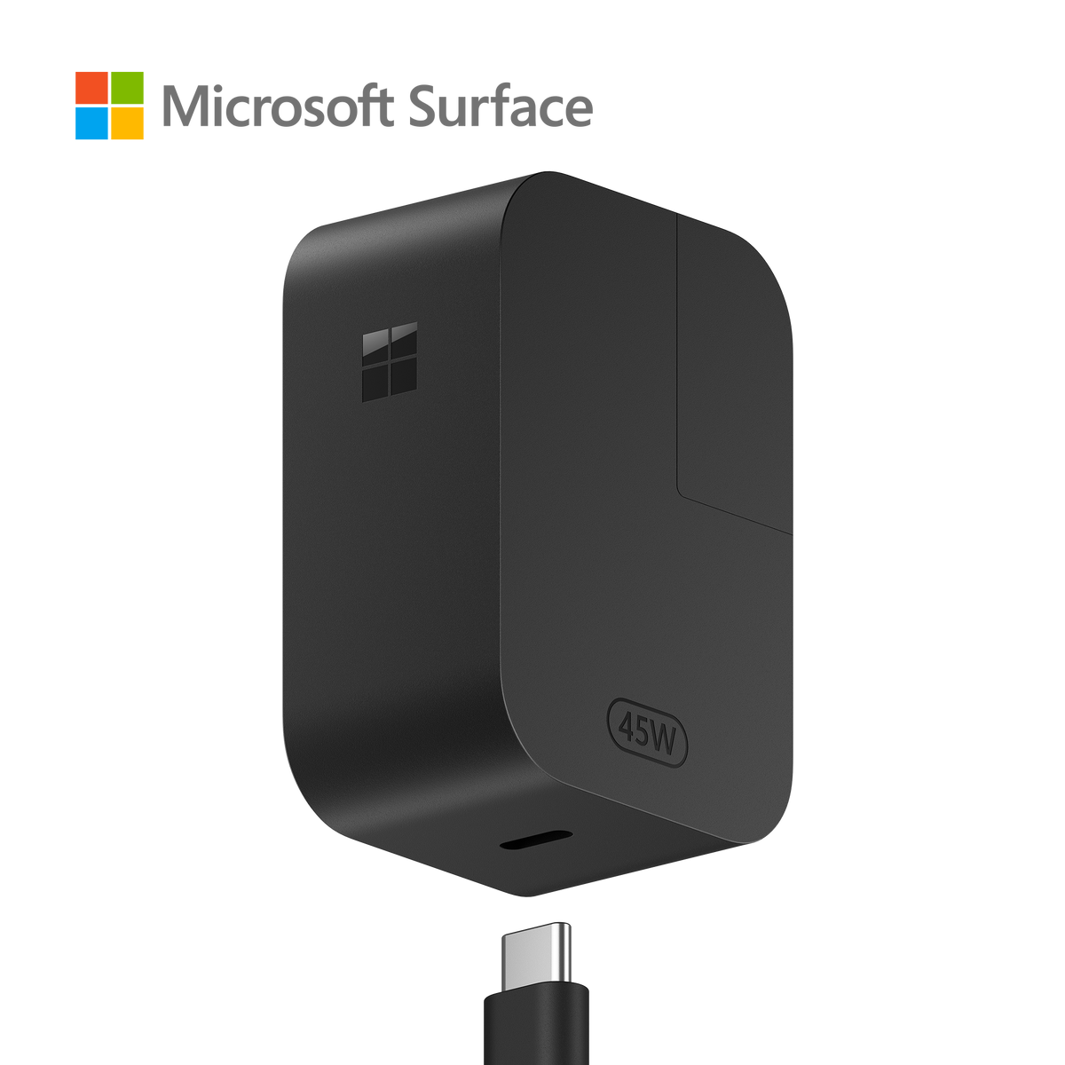 Cargador negro Microsoft Surface con conector USB-C, sobre fondo negro.