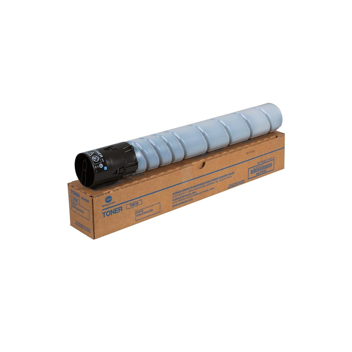 Une cartouche de toner Konica Minolta et une boîte, toner gris, boîte marron.