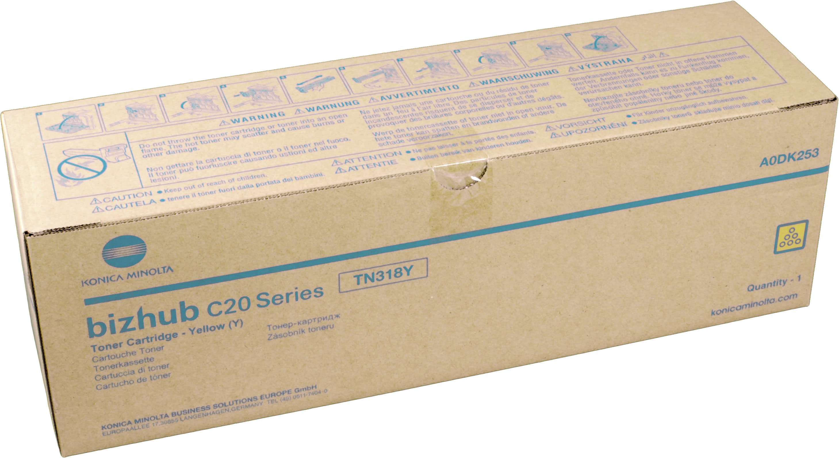Scatola toner Konica Minolta. Scatola di cartone marrone con testo e logo.