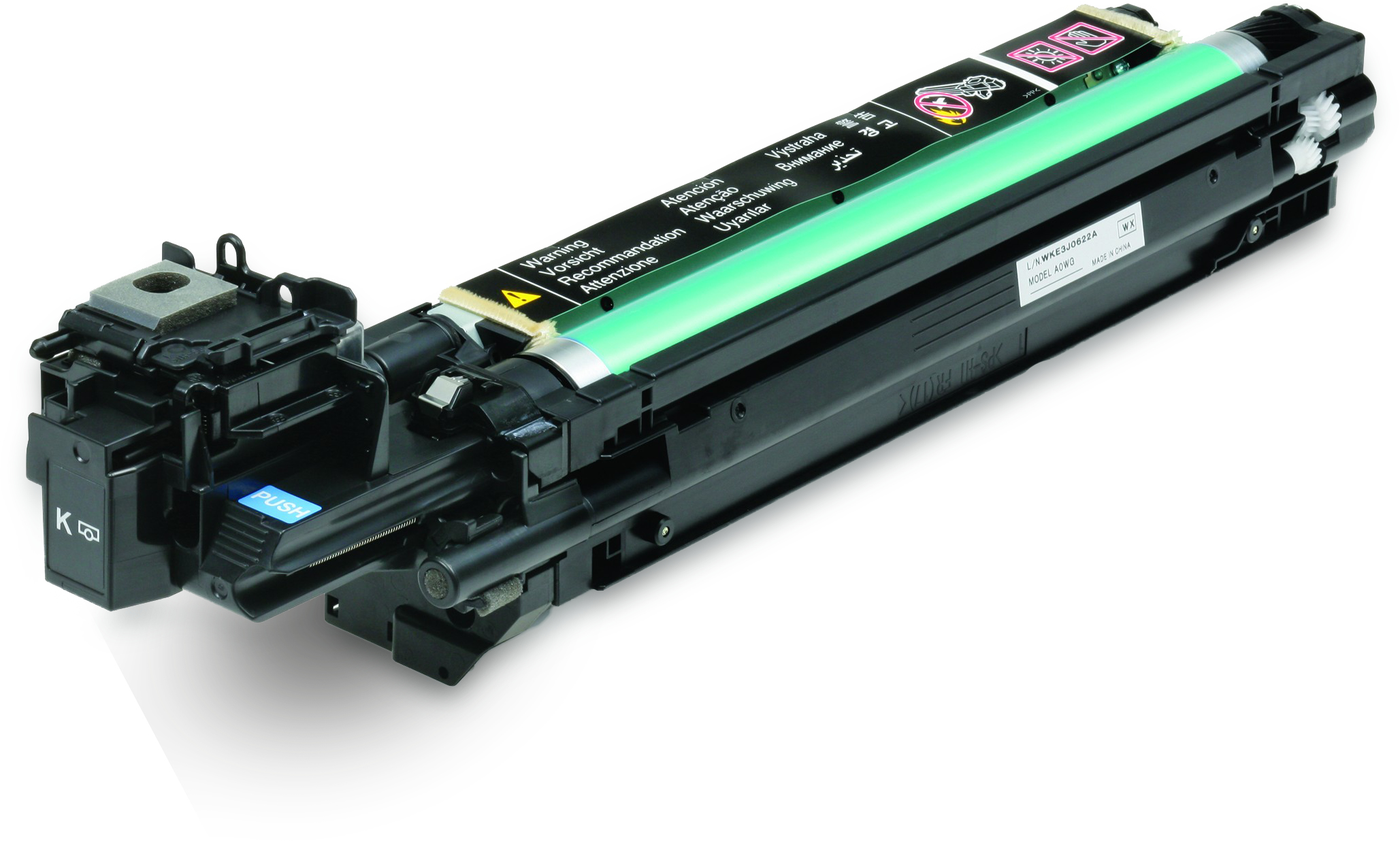 Cartuccia toner per stampante nera con cilindro verde e varie etichette di avvertimento.