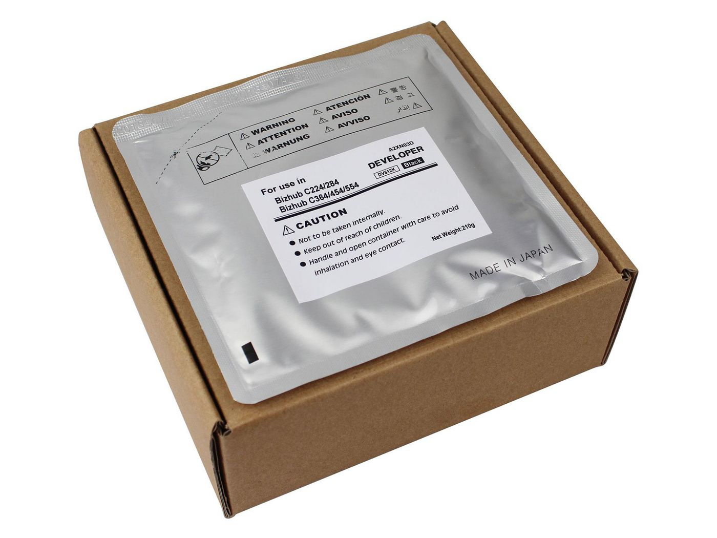 Srebrna paczka i brązowe pudełko z etykietami. Zawiera proszek do wywoływania.