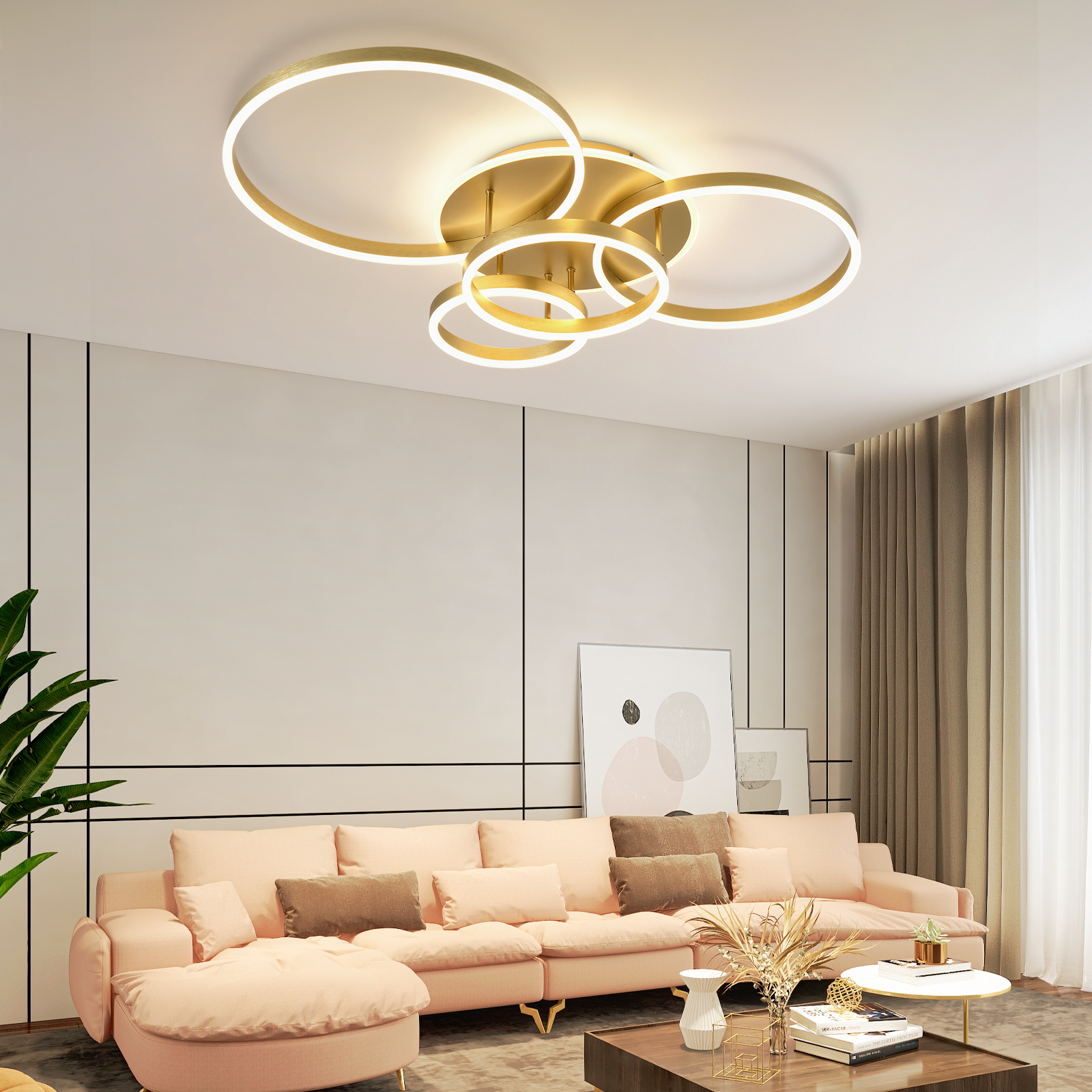 Luz de techo dorada en una sala de estar con sofá rosa, mesa de centro y decoraciones.