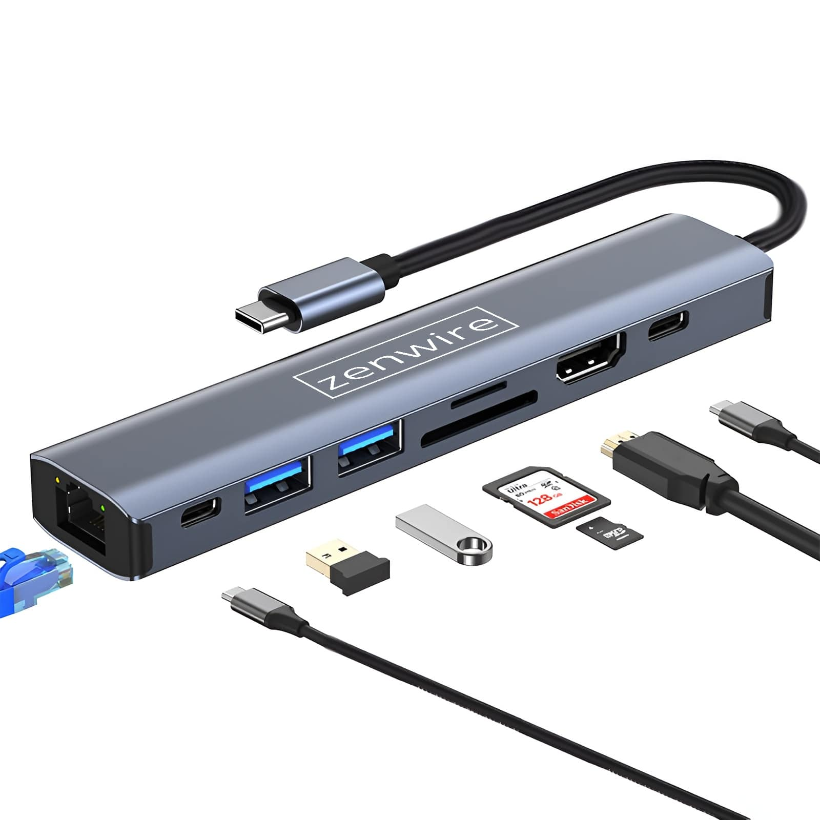 Srebrny hub USB z wieloma portami i akcesoriami na białej powierzchni.