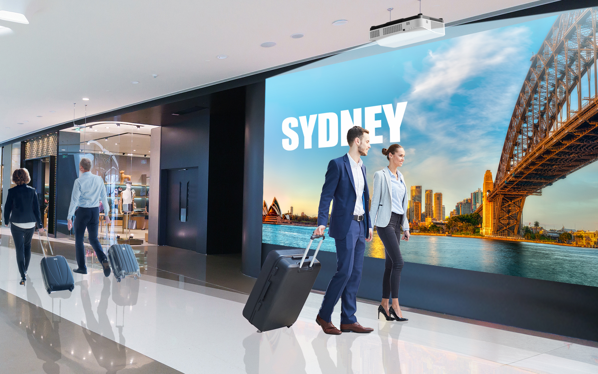 Ludzie spacerują w centrum handlowym z projekcją Sydney. Widoczny most w Sydney.