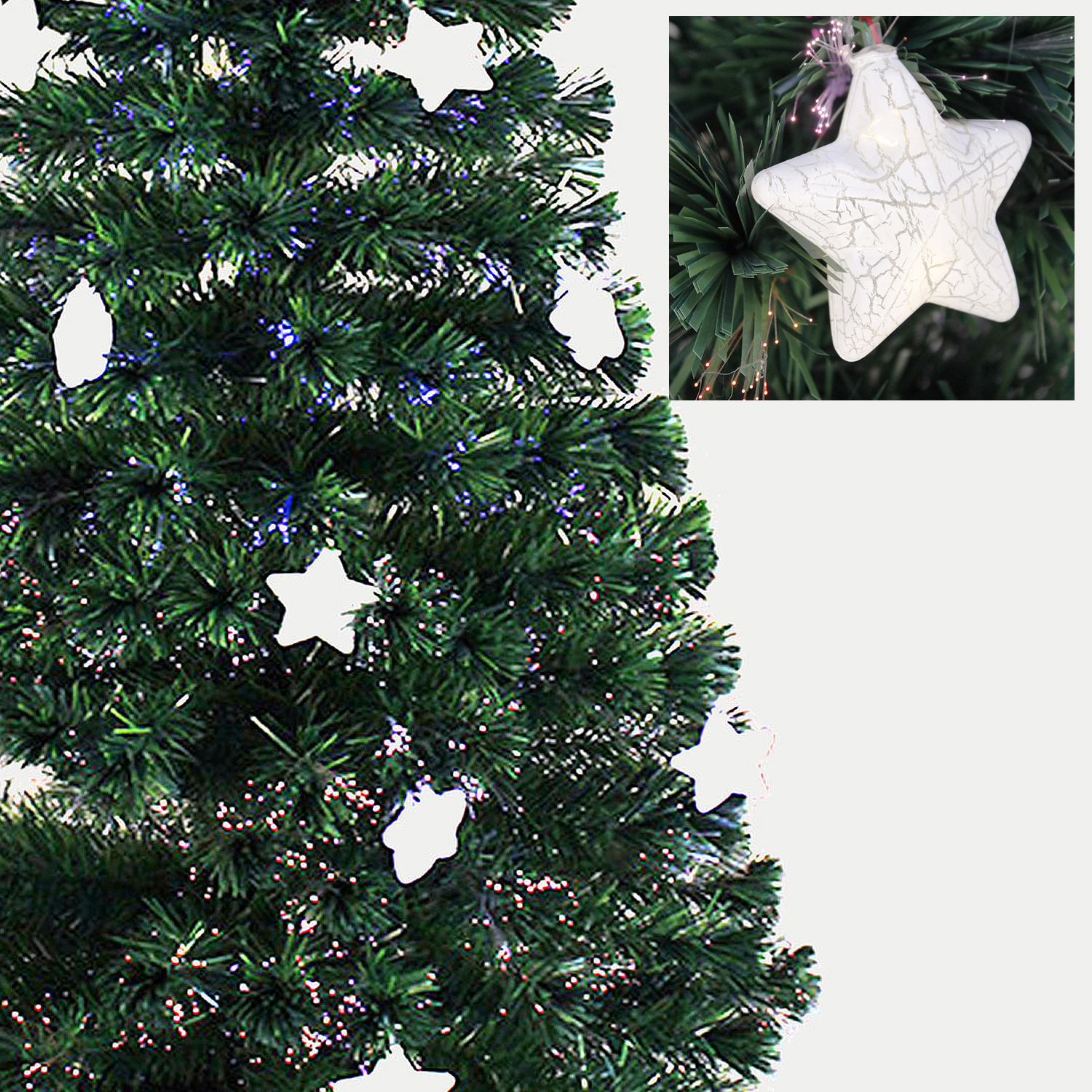 Un albero di Natale verde con ornamenti a stella bianchi. Un primo piano di una stella è in alto a destra.