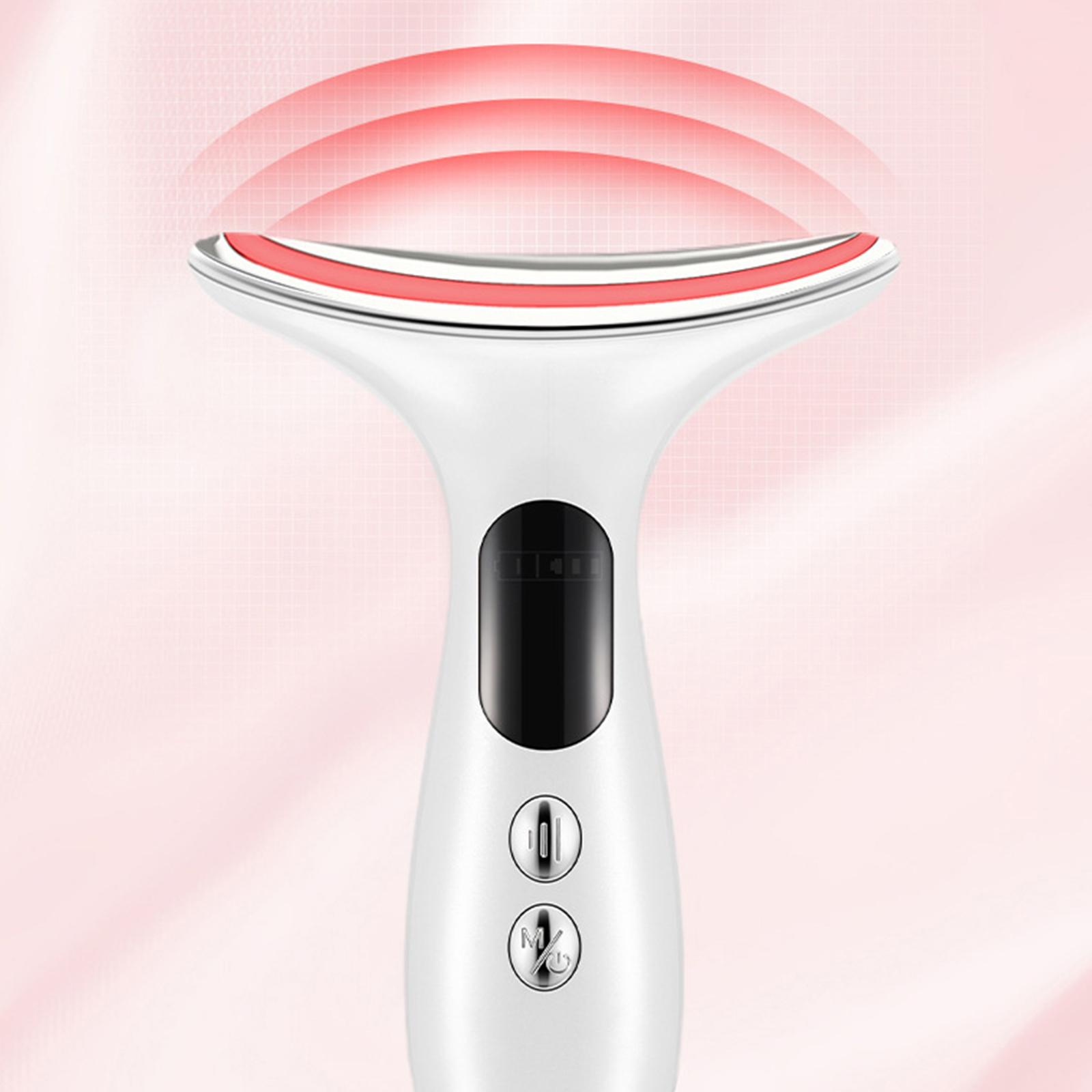 Weißes Schönheitsgerät mit rotem Licht und Knöpfen, auf rosa Hintergrund.