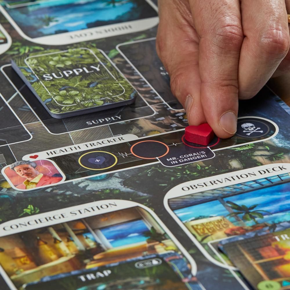 Spielbrett-Detail. Ein rotes Token wird auf einem Brett platziert. Karten sind im Hintergrund. Text: Mr. Coral in Gefahr!