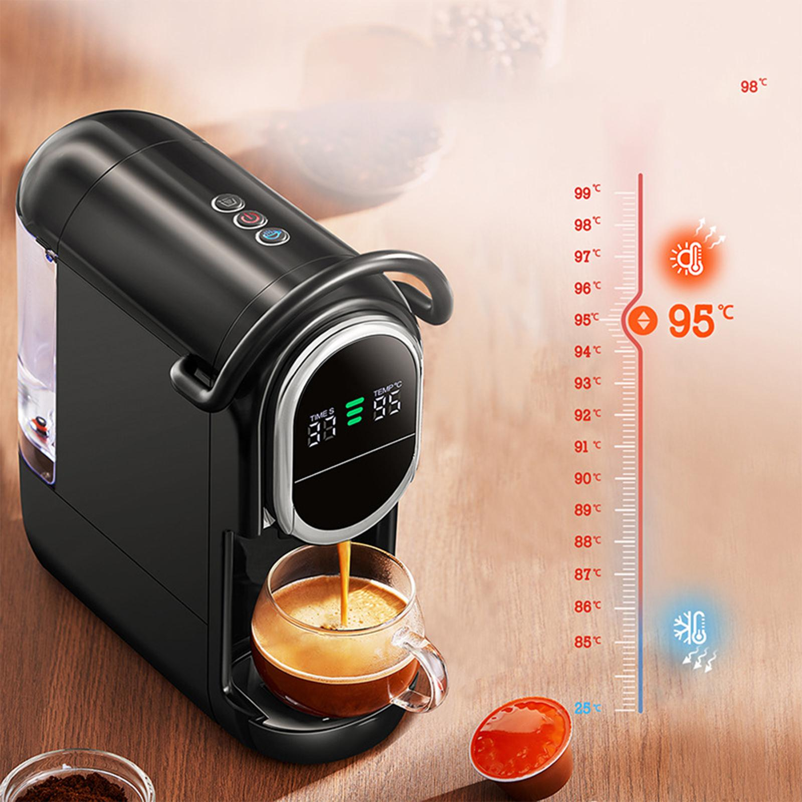 Schwarze Kaffeemaschine, die Kaffee in eine Glastasse gießt. Temperatur zeigend. Rote und braune Akzente. Nahaufnahme.