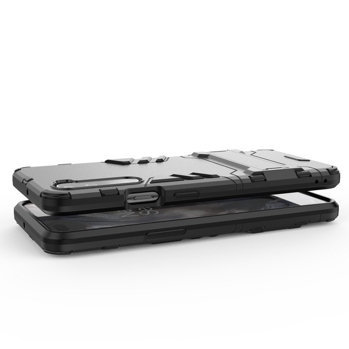Dos fundas para teléfono, una encima de la otra. Fundas de teléfono grises y negras.
