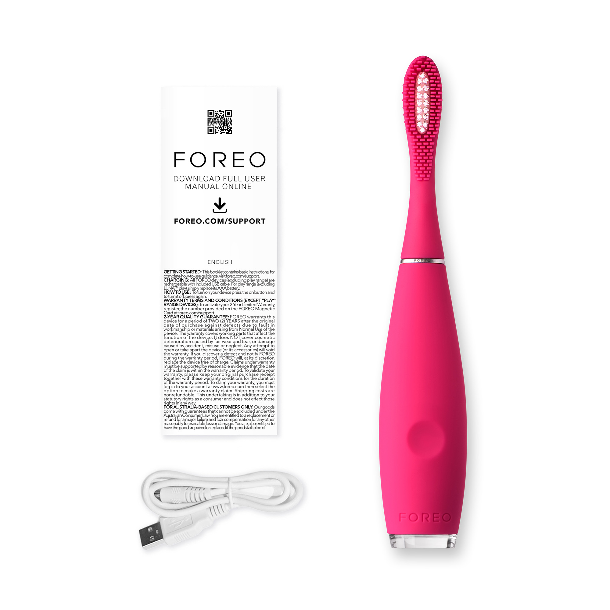 Pembe Foreo diş fırçası, kullanım kılavuzu ve USB kablosu beyaz zemin üzerinde.