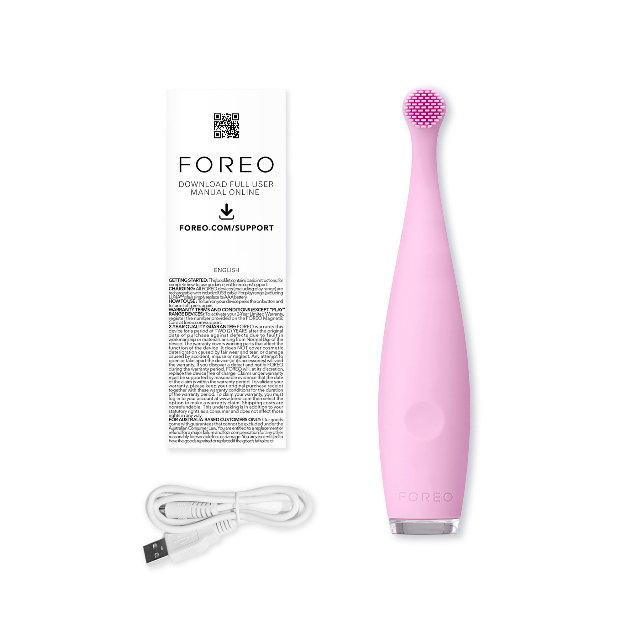 Cepillo de dientes Foreo rosa con manual y cable de carga sobre una superficie blanca.