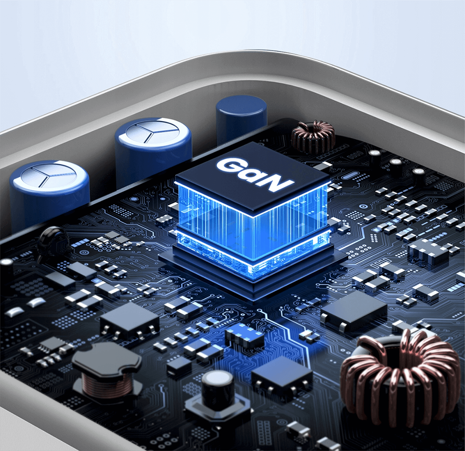 Zbliżenie płytki drukowanej z niebieską kostką GaN pośrodku. Widoczne są niebieskie cylindry i cewki.