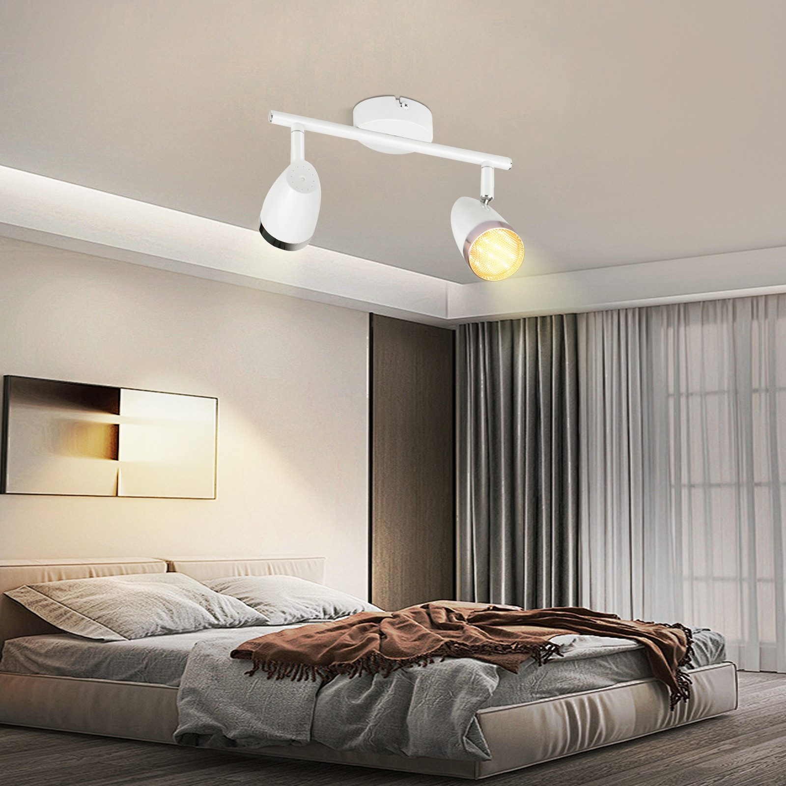 Biała oprawa oświetleniowa szynowa z dwoma reflektorami. Sypialnia z łóżkiem, obrazem, oknem i zasłonami.