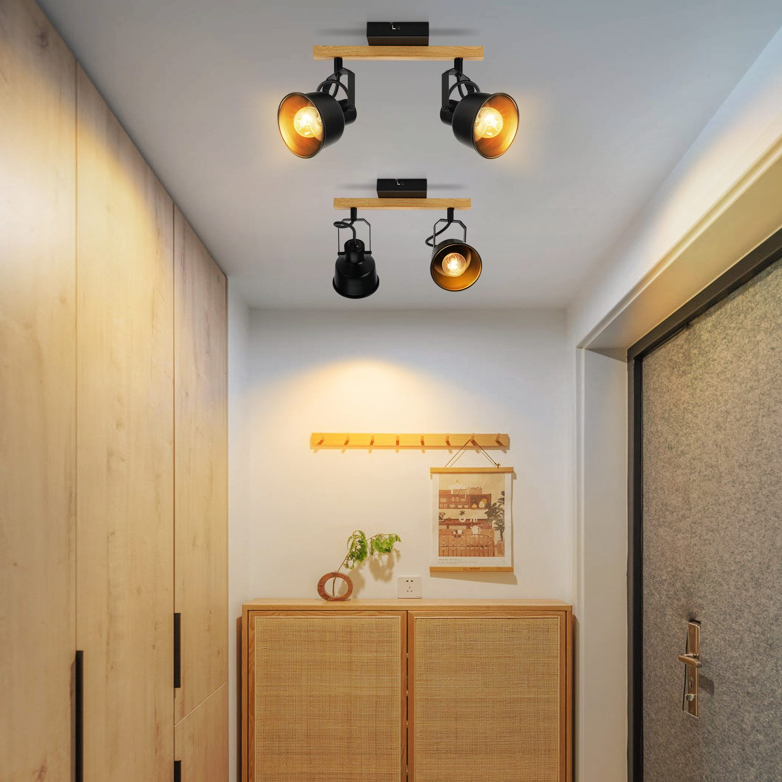 Korytarz z dwoma zestawami reflektorów na drewnianych belkach i drewnianą szafką.