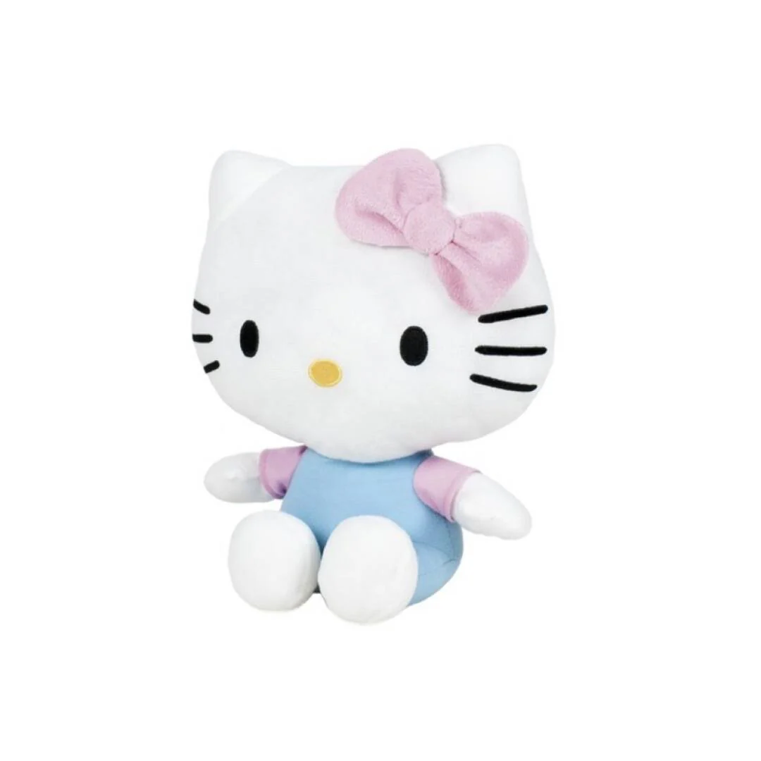 Hello Kitty Plüschtier, weiß mit rosa Schleife und blauem Oberteil. Es sitzt.