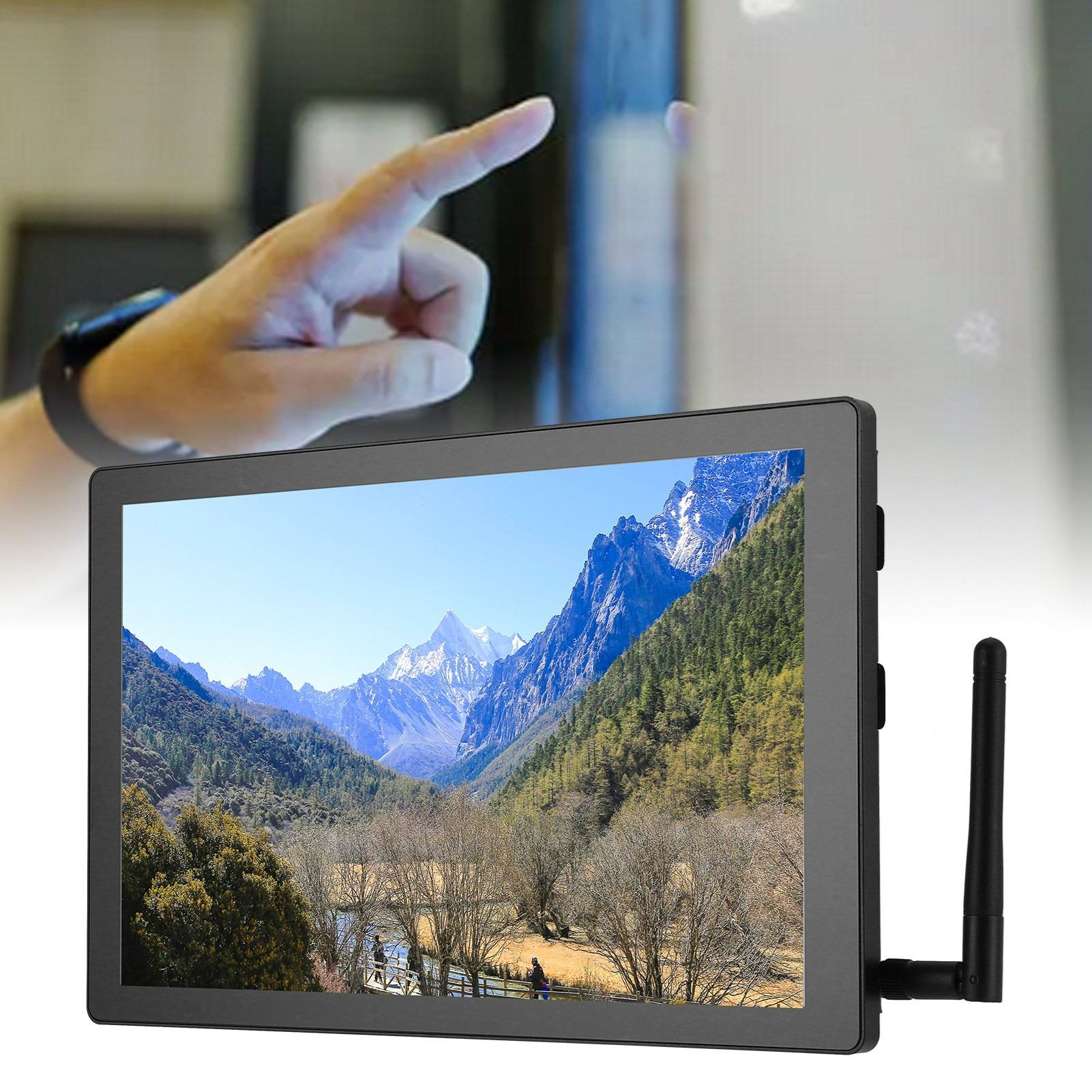 Hand zeigt auf einen Monitor mit Berglandschaft, mit Antenne.