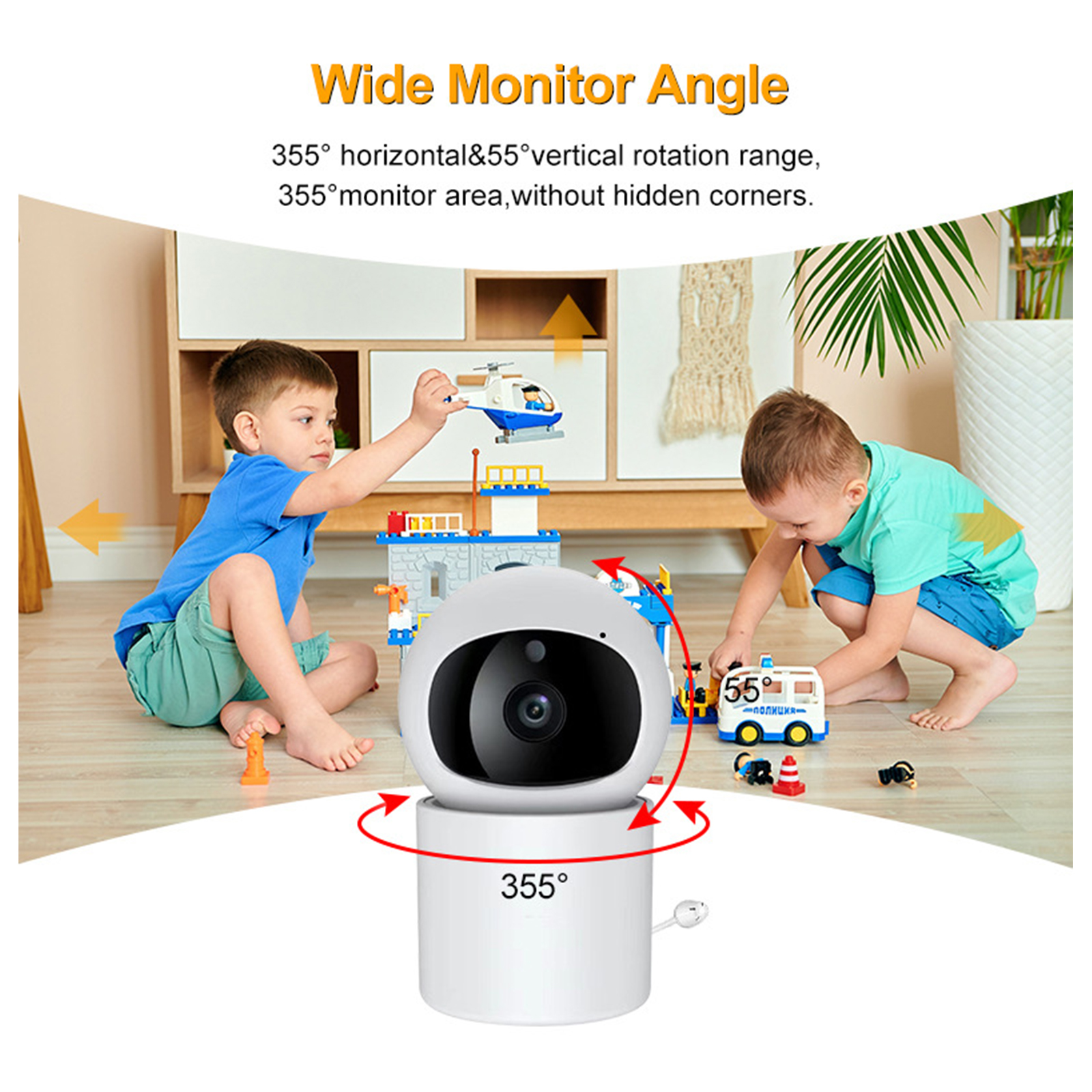 Zwei Jungen spielen mit Spielzeug in der Nähe eines Babyphones mit rotierender Kamera.