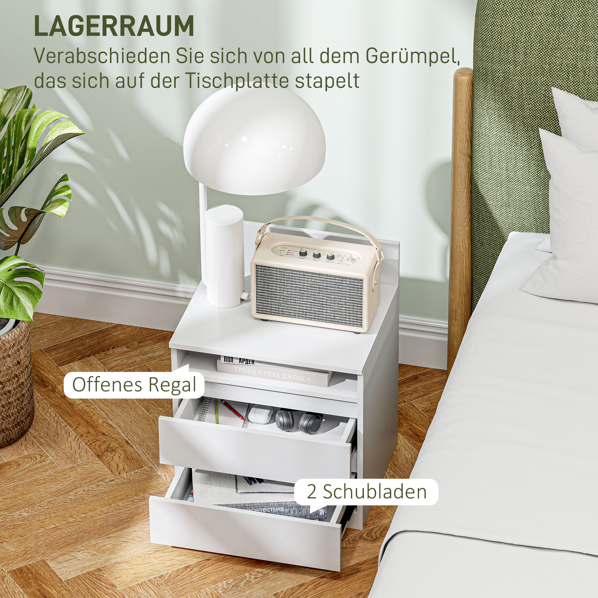 Weißer Nachttisch mit Schubladen, Lampe und Dekorationen.