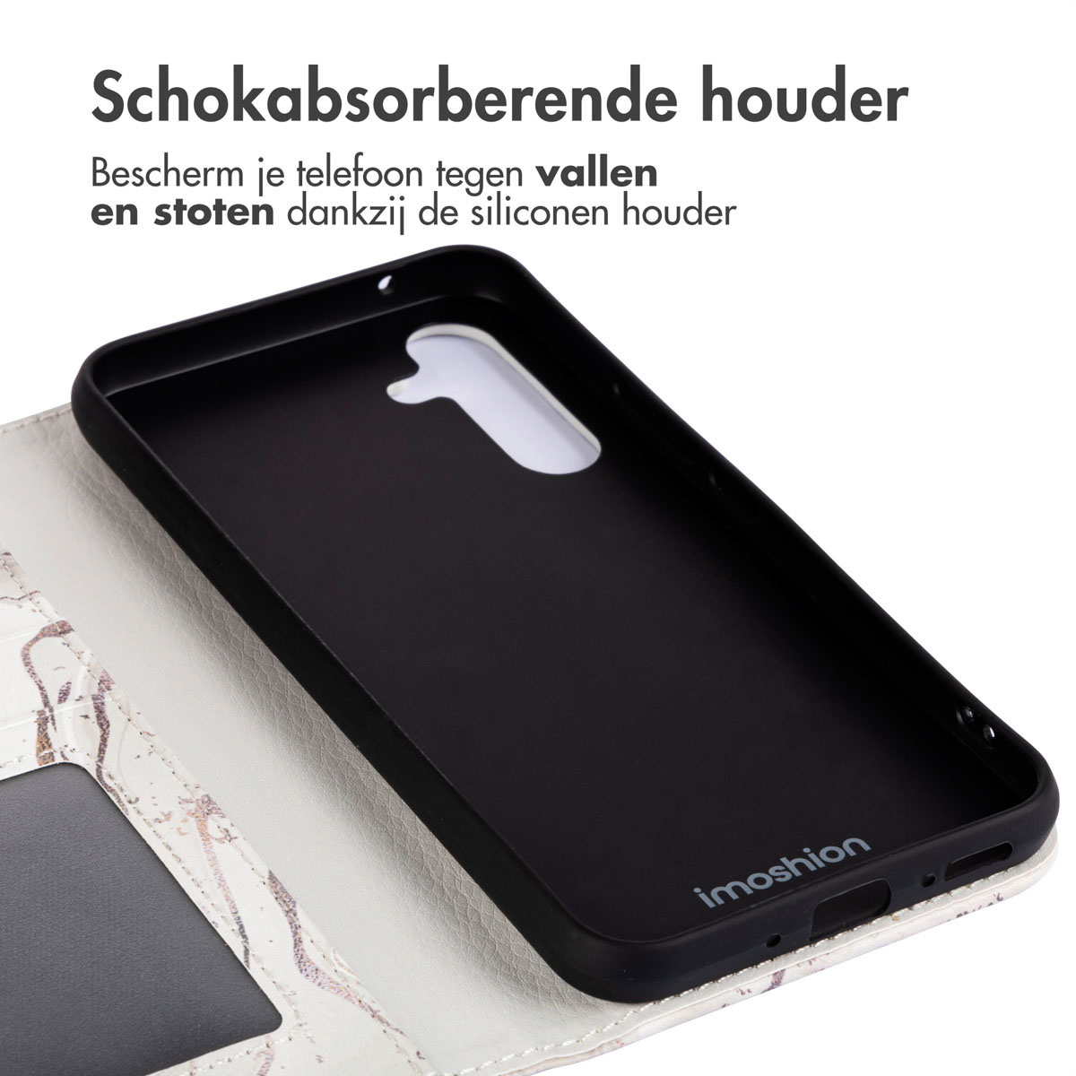 Intérieur de la coque de téléphone. Coque noire avec un téléphone à l'intérieur, montrant l'intérieur et la marque Imoshion.