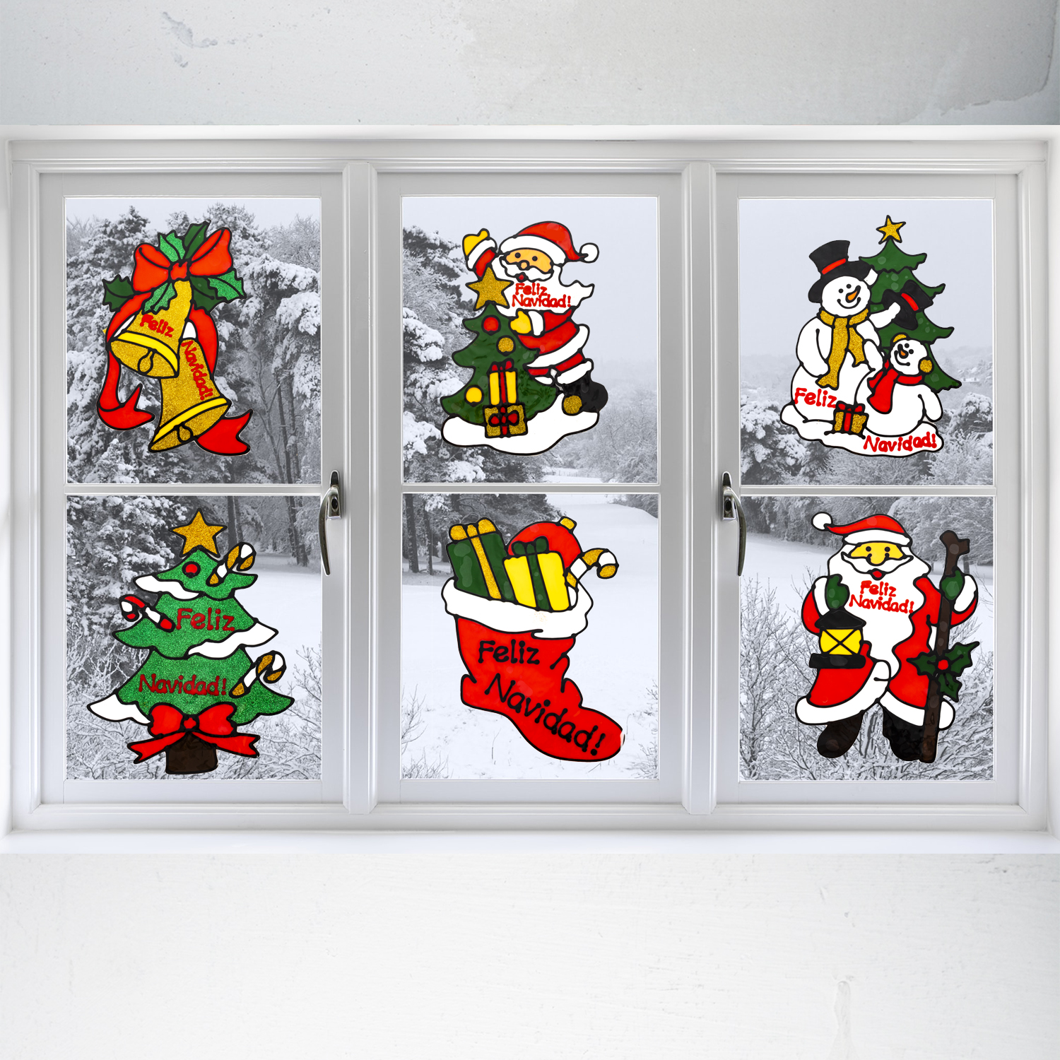 Finestra con decalcomanie natalizie: campane, Babbo Natale, pupazzo di neve, albero di Natale, calza e un altro Babbo Natale.