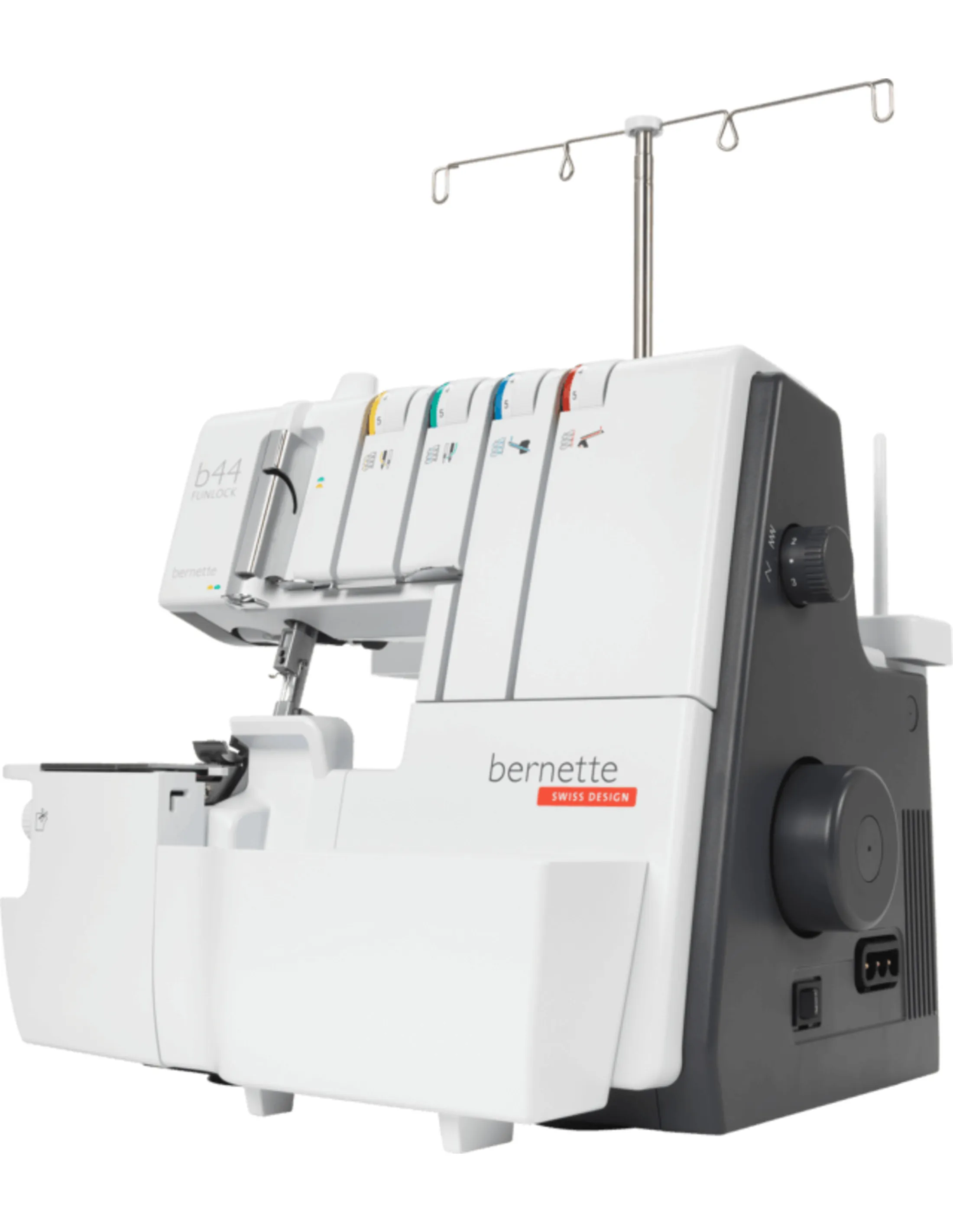White and grey Bernette sewing machine. Multi-colored thread spools visible.