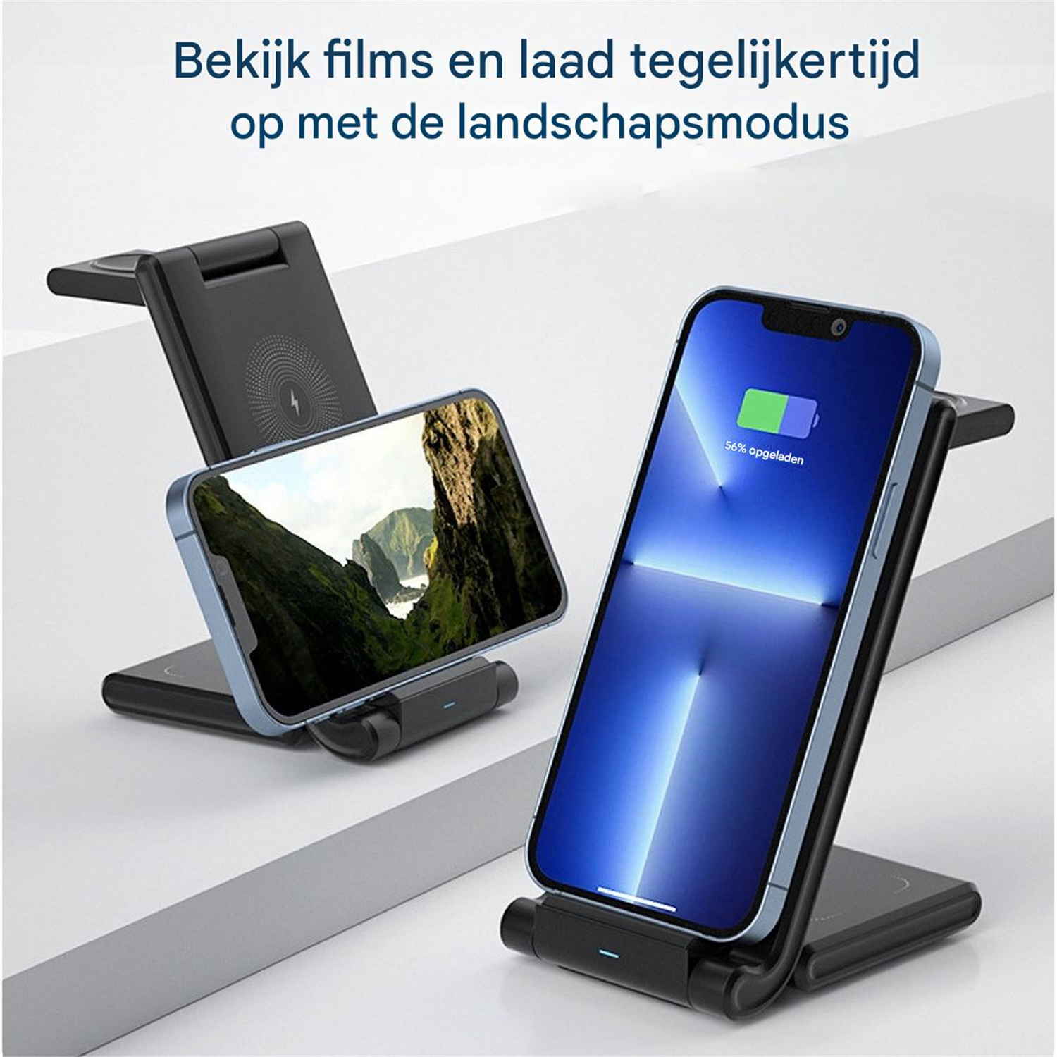 Zwei Telefone werden auf einem Ständer aufgeladen. Eines zeigt eine Landschaft, das andere einen blauen Ladebildschirm.