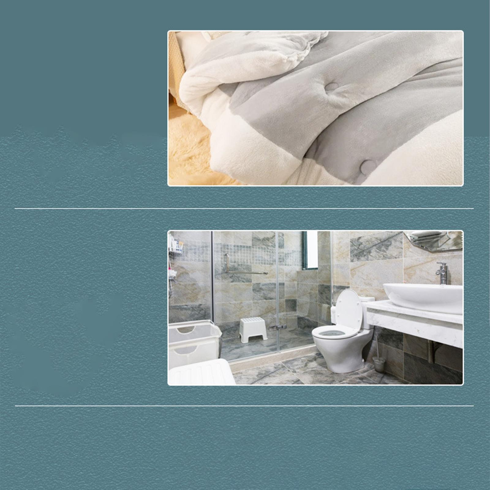 Badezimmer-Szene mit Toilette, Waschbecken und Duschbereich.