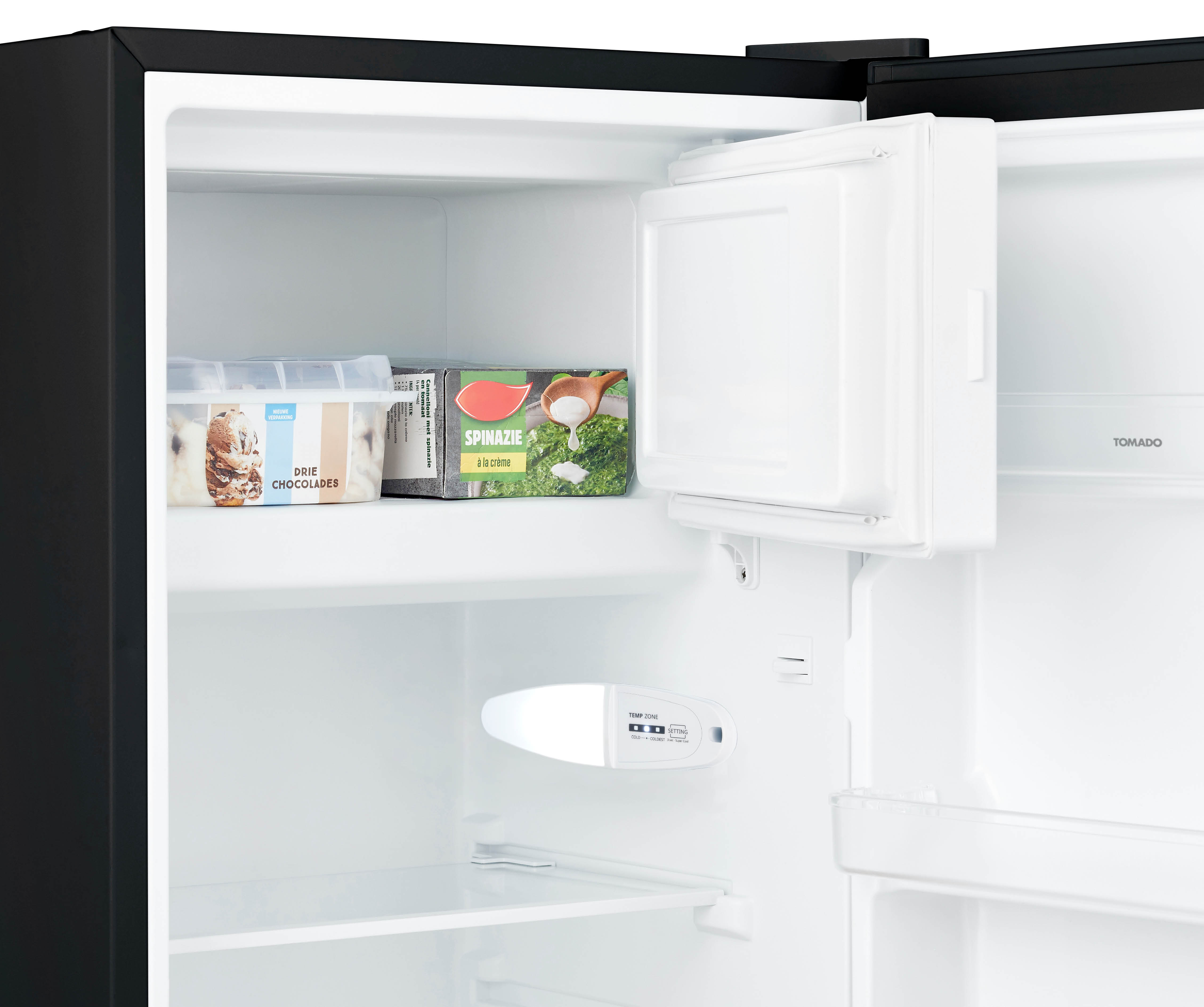 Refrigerator interior with shelves, and contents including ice cream and vegetables.